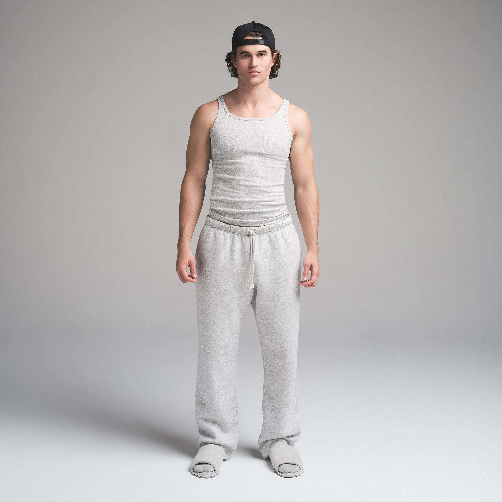 SKIMS COTTON MENS RIB TANK 3-PACK | HEATHER MULTI ON A MODEL FRONT VIEW | FOCUS: 0.0, 1.0, 0.9