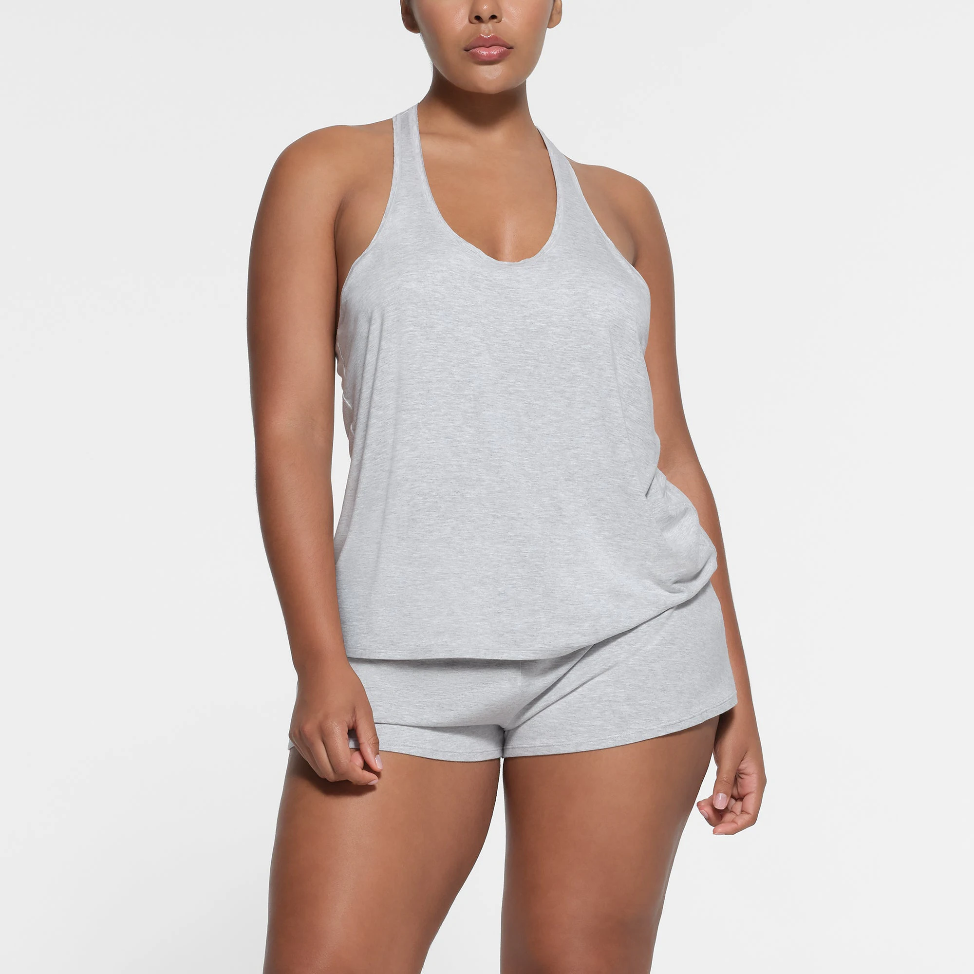 SKIMS SLEEP LOOSE TANK | LIGHT HEATHER GREY ON A MODEL FRONT VIEW