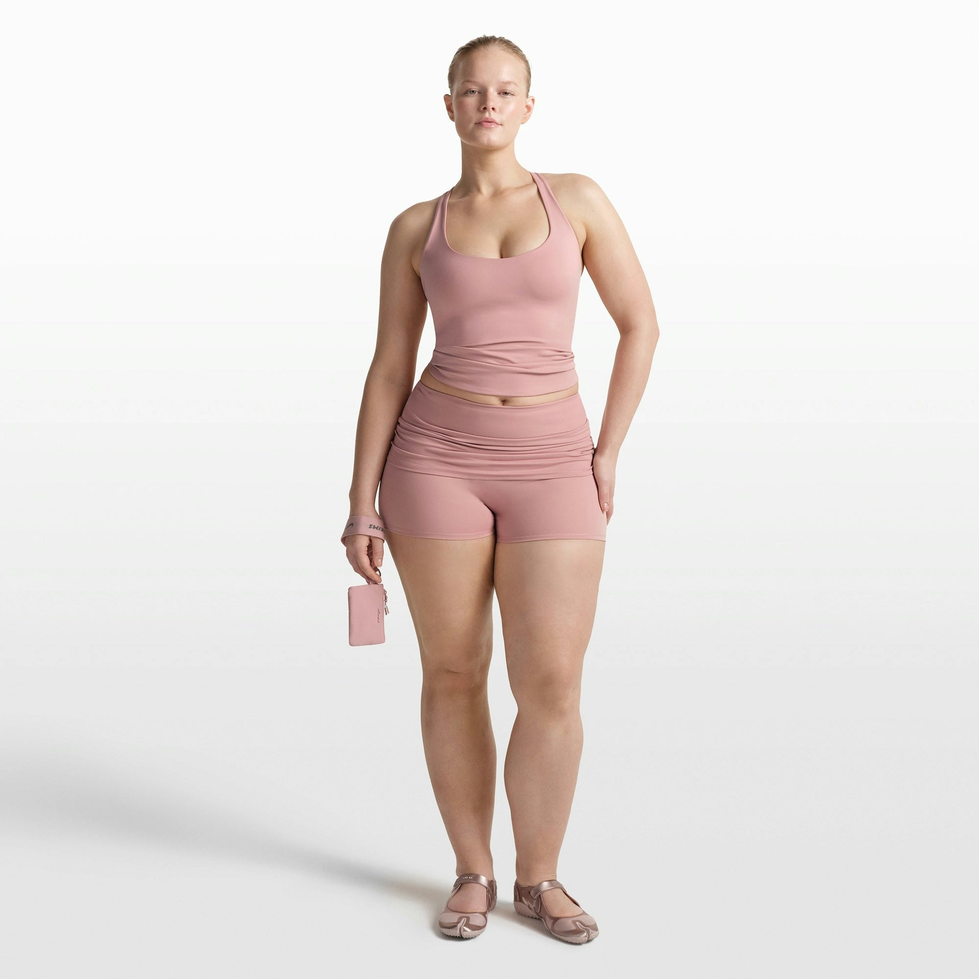 NikeSKIMS MATTE RACER BACK TANK | HIMALAYAN ON A MODEL FRONT VIEW @ | FOCUS: 0.0, 1.0, 0.9