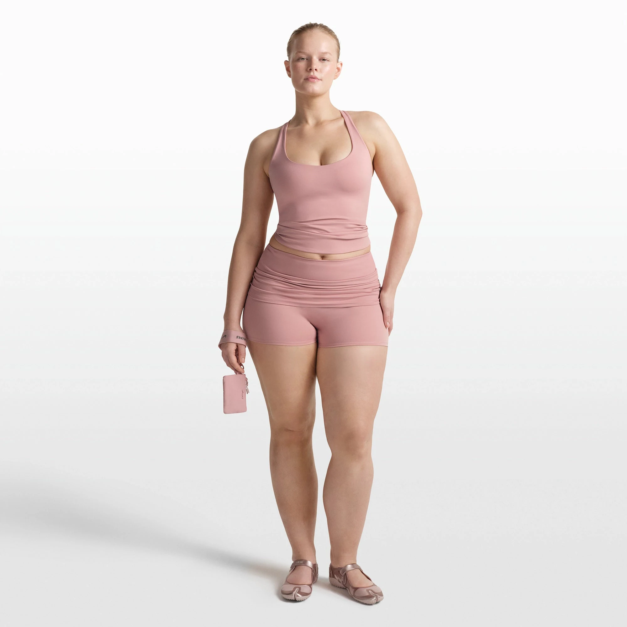 NikeSKIMS MATTE RACER BACK TANK | HIMALAYAN ON A MODEL FRONT VIEW @ | FOCUS: 0.0, 1.0, 0.9
