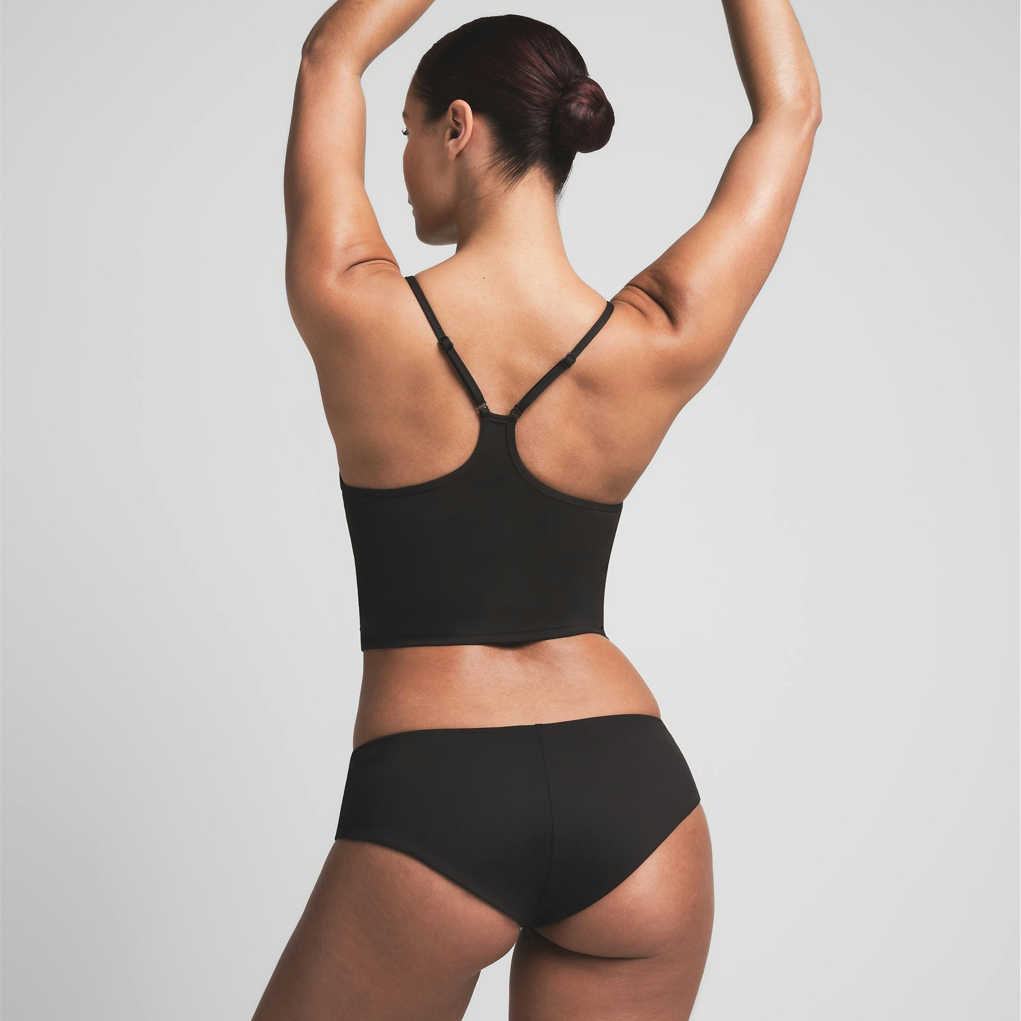 SIGNATURE SWIM CAMI TOP | ONYX ON A MODEL BACK VIEW | FOCUS: 0.0, 1.0, 0.9