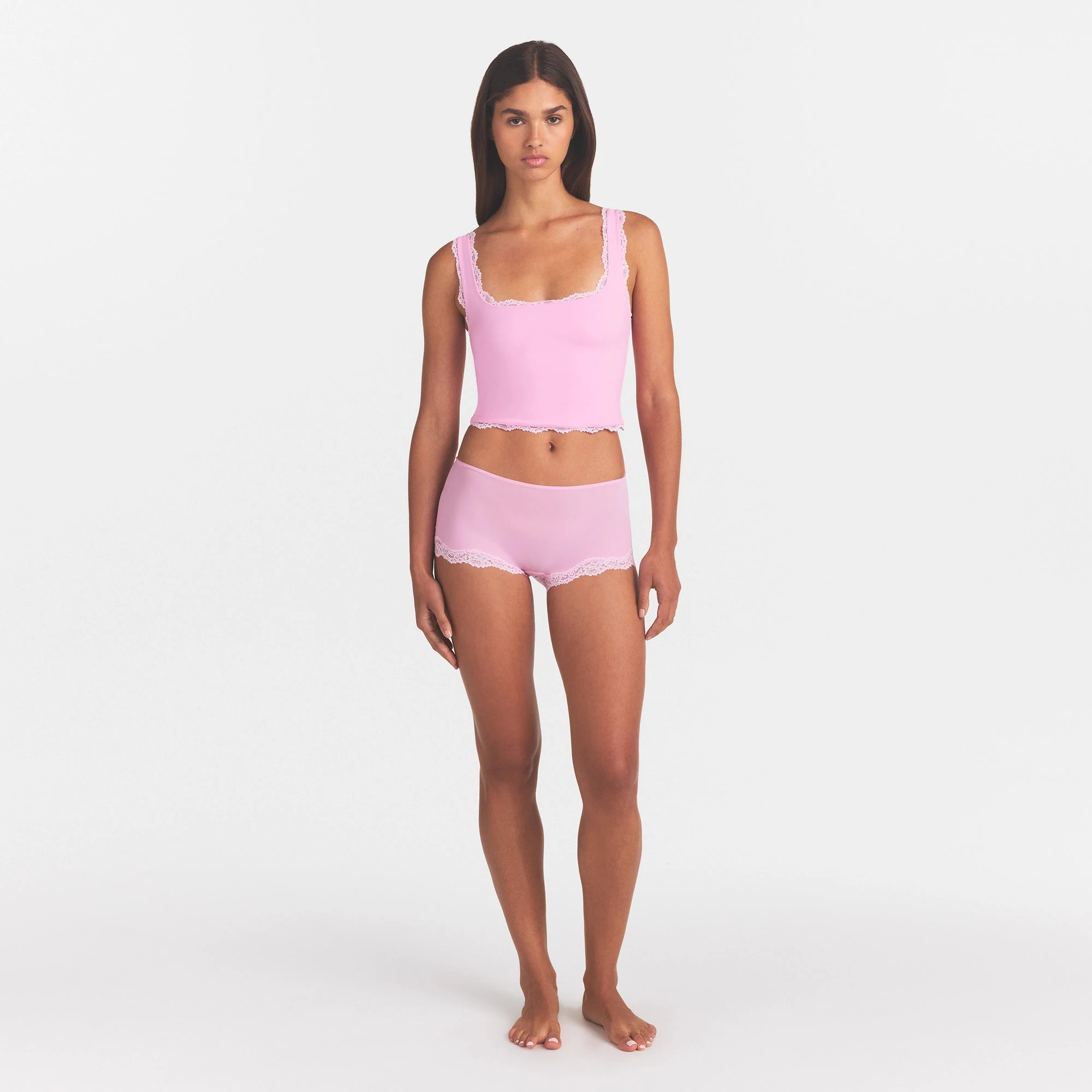 FITS EVERYBODY LACE TANK | BUBBLE GUM TONAL ON A MODEL FRONT VIEW @ | FOCUS: 0.0, 1.0, 0.9