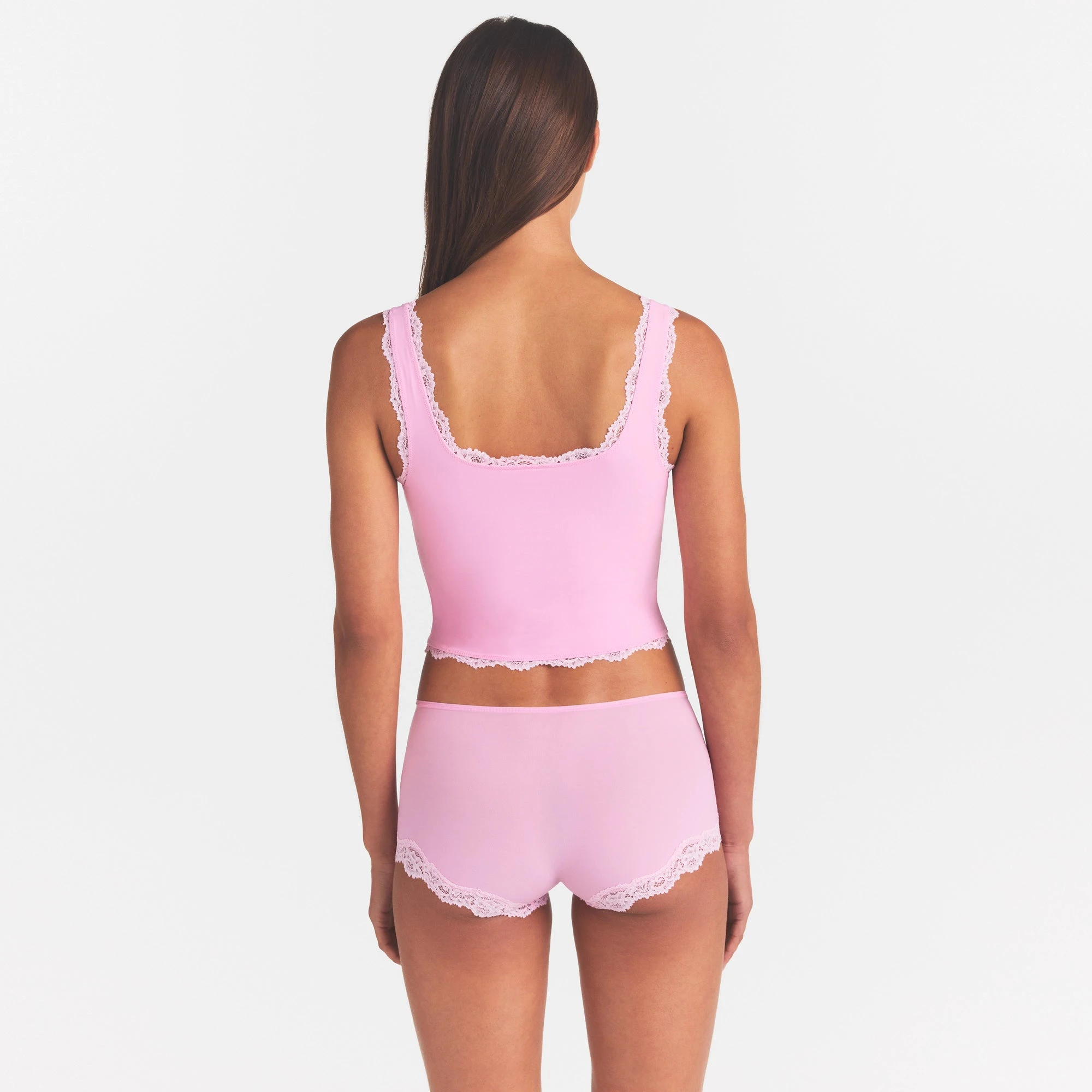 FITS EVERYBODY LACE TANK | BUBBLE GUM TONAL ON A MODEL SIDE VIEW