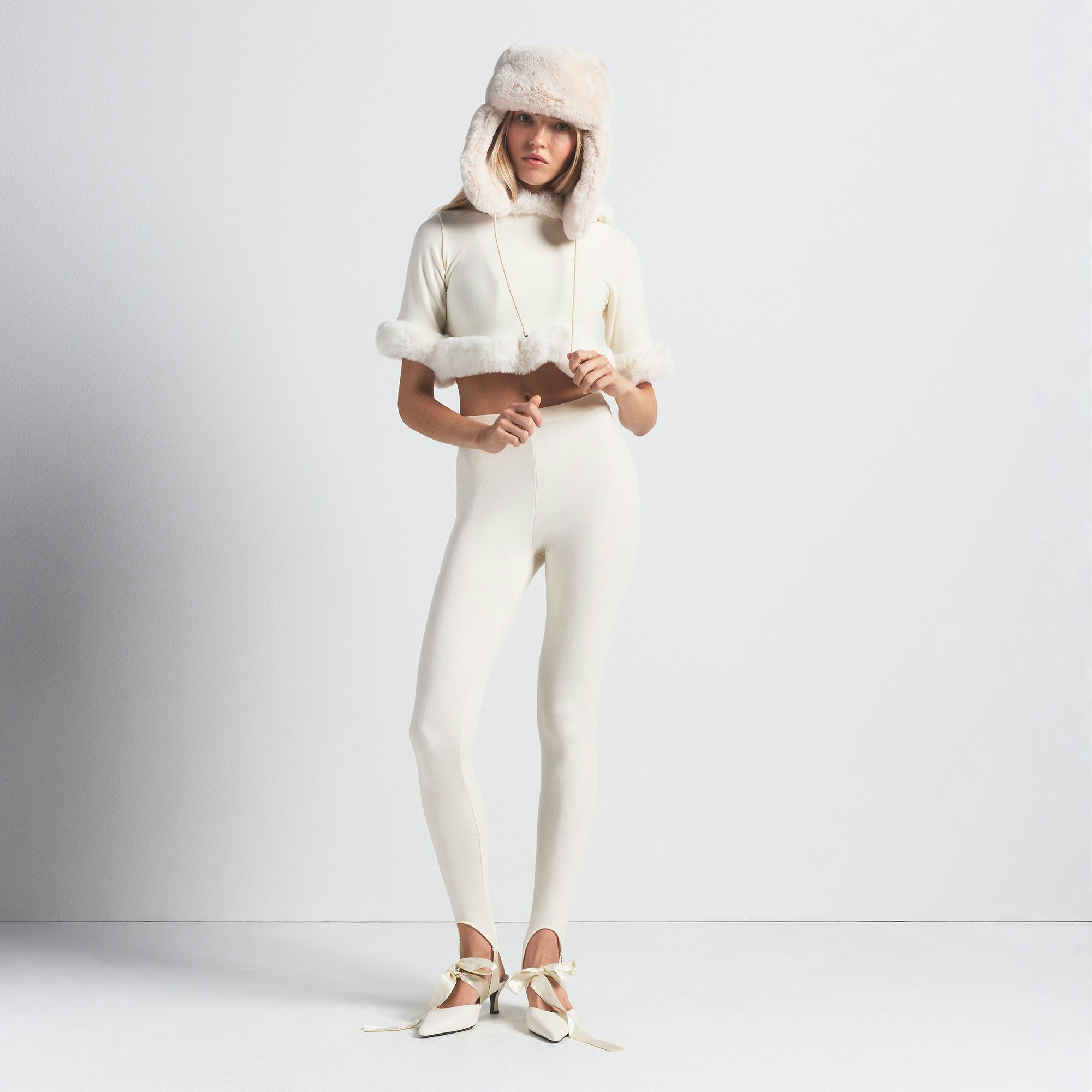 SKIMS CLOUD SHRUNKEN HOODIE | ECRU ON A MODEL FRONT VIEW @ | FOCUS: 0.0, 1.0, 0.9