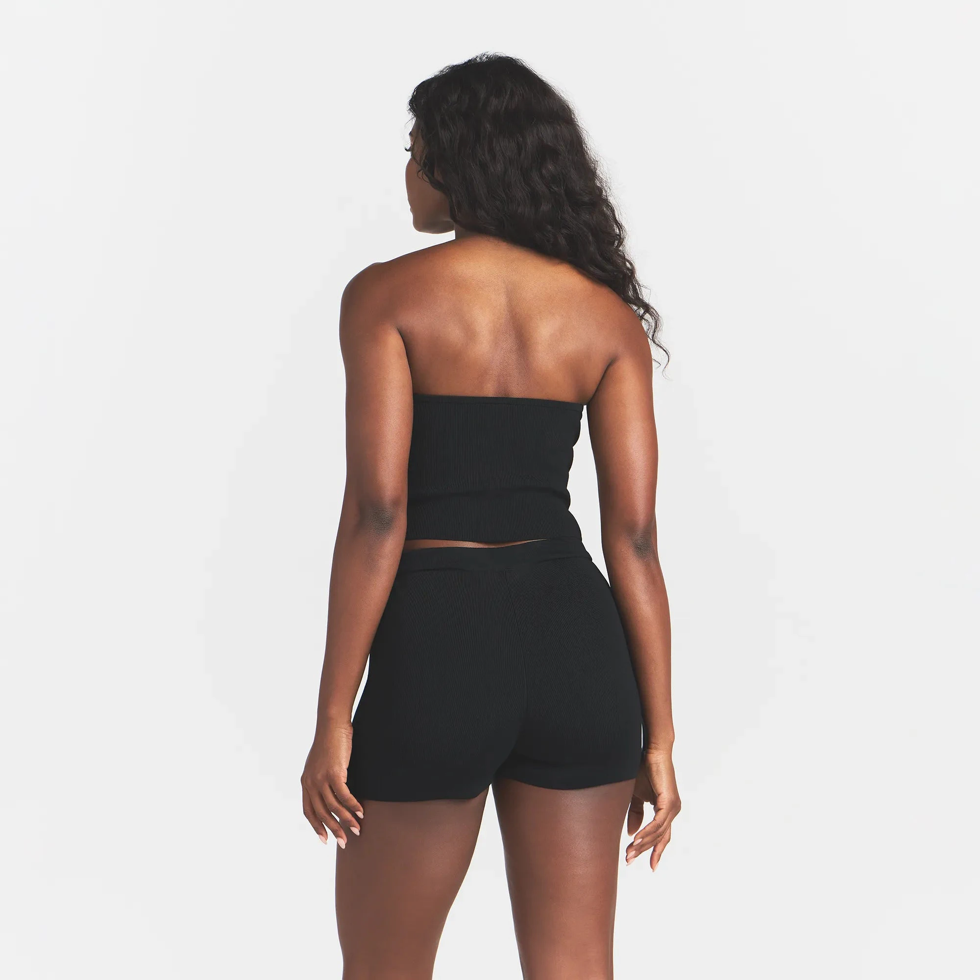 REFINED KNIT TUBE TOP | OBSIDIAN ON A MODEL FRONT VIEW @ | FOCUS: 0.0, 1.0, 0.9