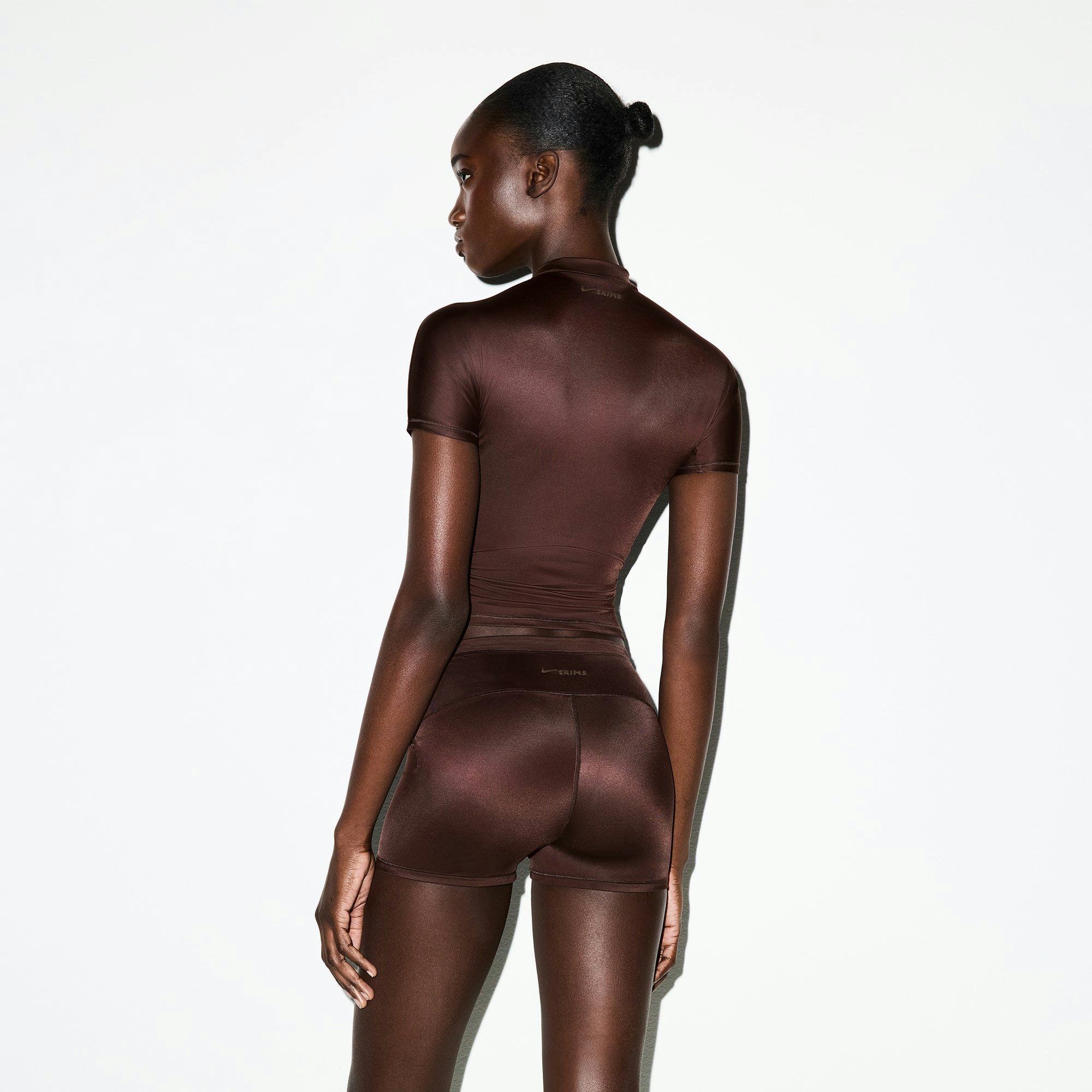 NikeSKIMS SHINE SHORT SLEEVE MOCK NECK TOP | PHOENIX ON A MODEL SIDE VIEW @ | FOCUS: 0.0, 1.0, 0.9