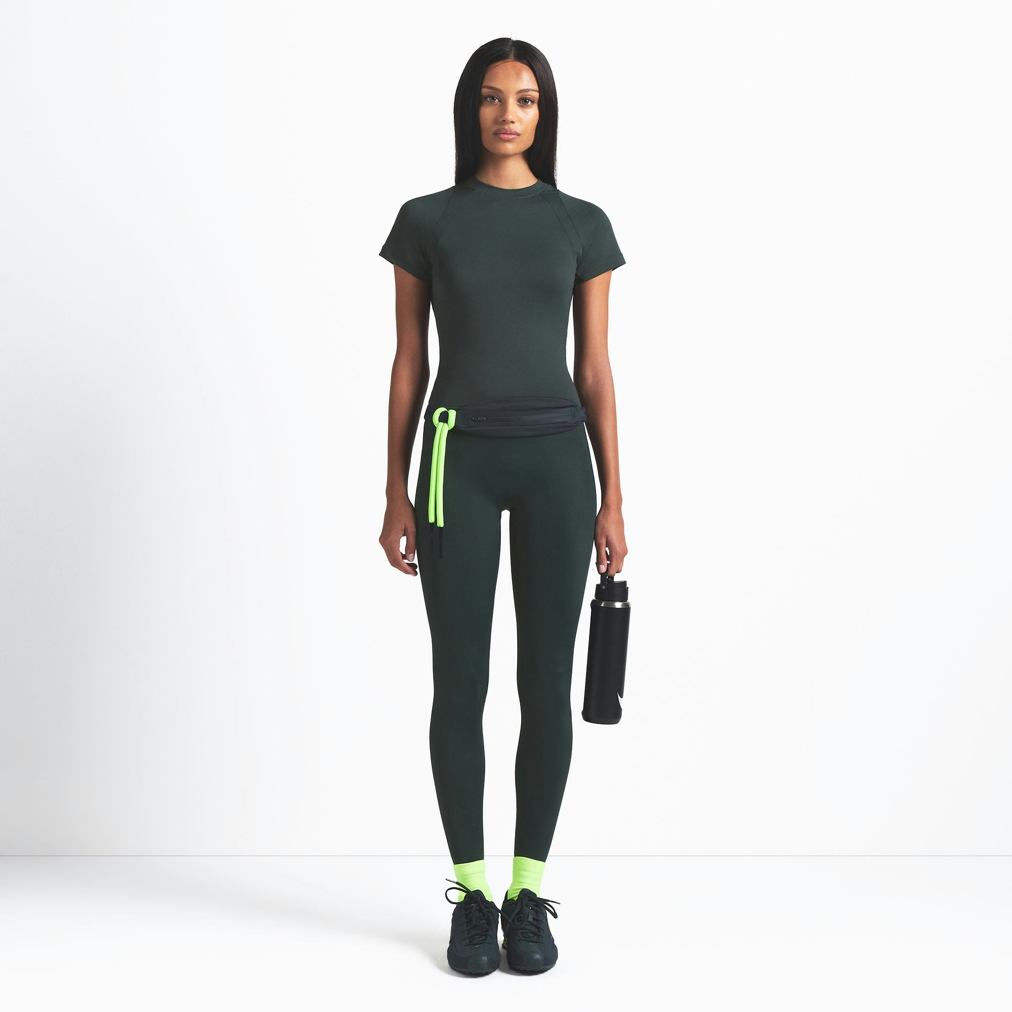 NikeSKIMS AIRY BABY TEE | DARK TEAL ON A MODEL FRONT VIEW @ | FOCUS: 0.0, 1.0, 0.9