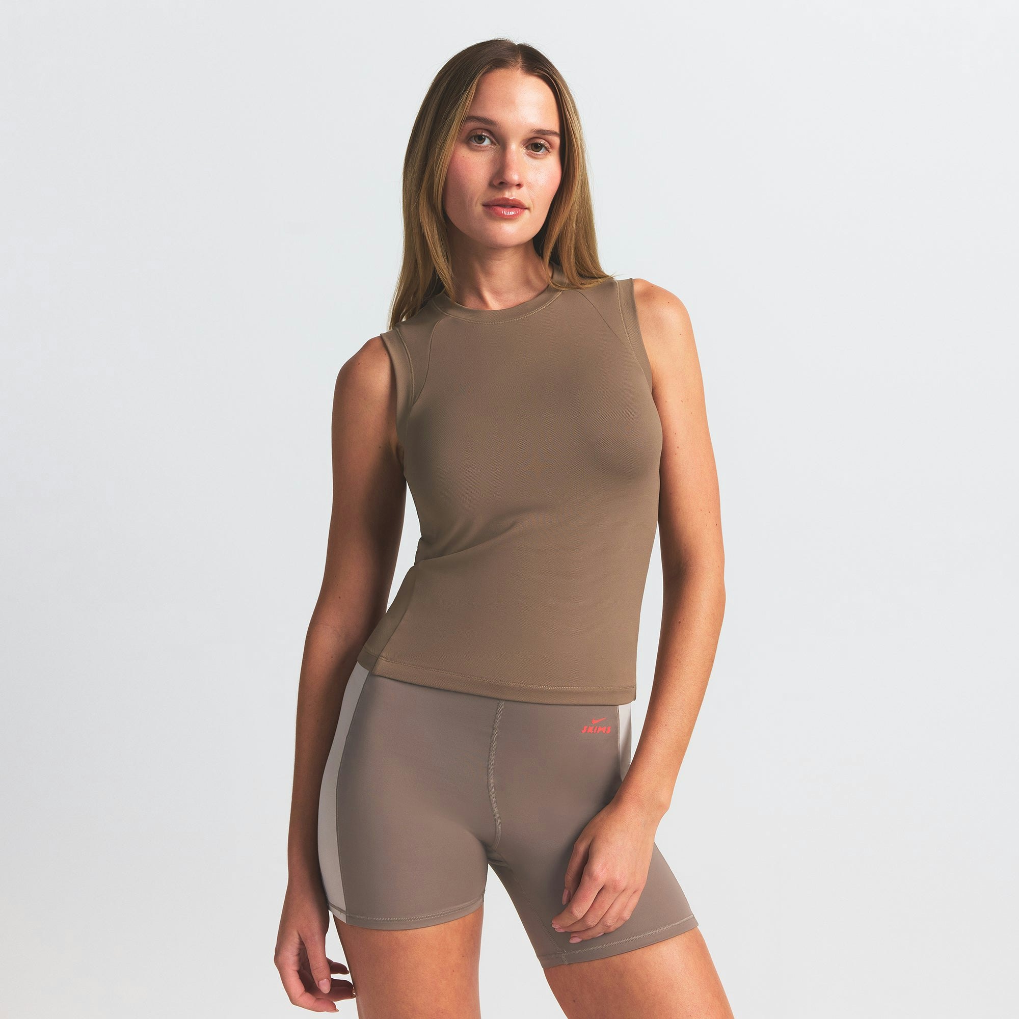 NikeSKIMS AIRY MUSCLE TEE | MYRRH ON A MODEL SIDE VIEW @ | FOCUS: 0.0, 1.0, 0.9