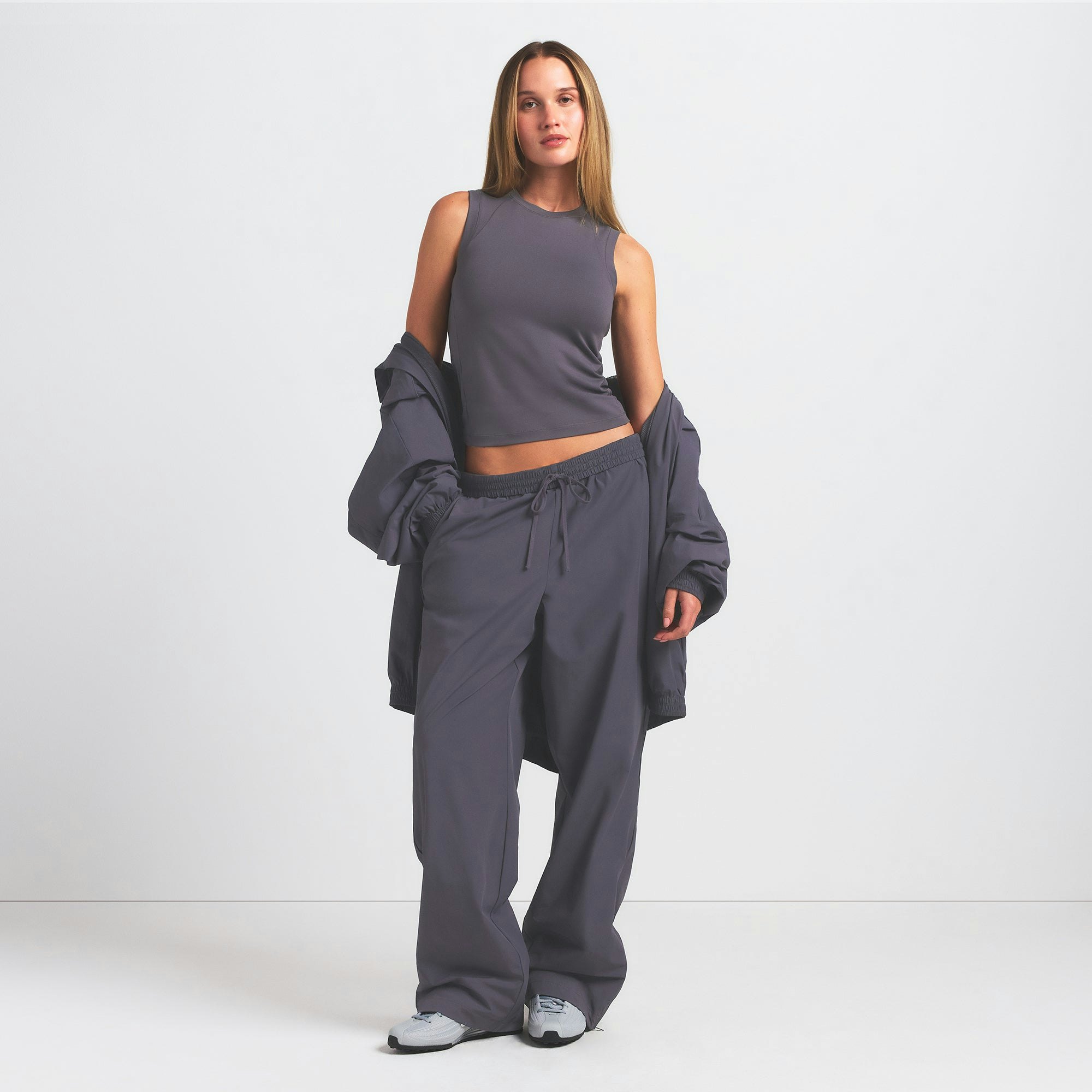 NikeSKIMS AIRY MUSCLE TEE | RAVEN ON A MODEL FRONT VIEW @ | FOCUS: 0.0, 1.0, 0.9