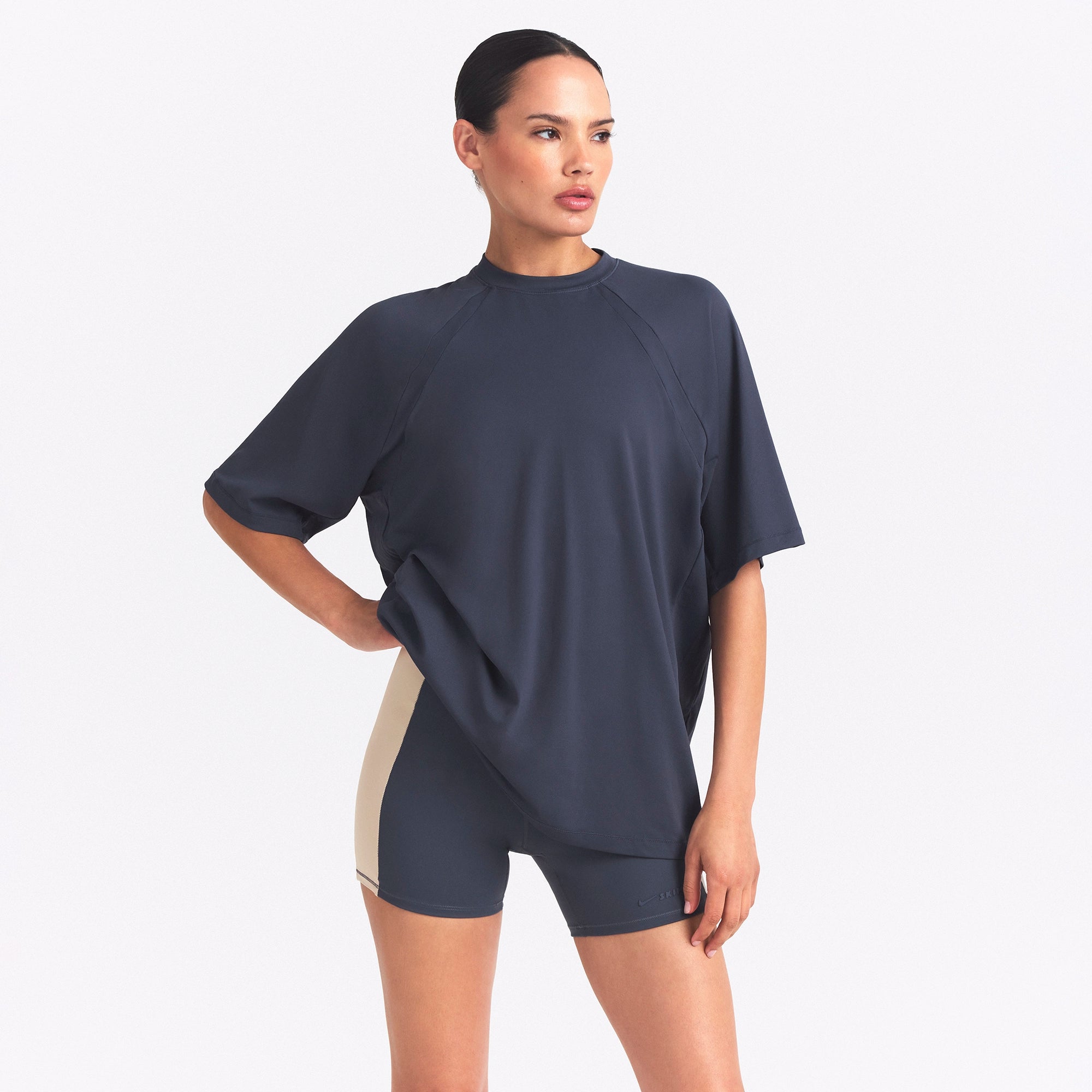 NikeSKIMS AIRY OVERSIZED TEE | DEEP ROYAL ON A MODEL SIDE VIEW @ | FOCUS: 0.0, 1.0, 0.9