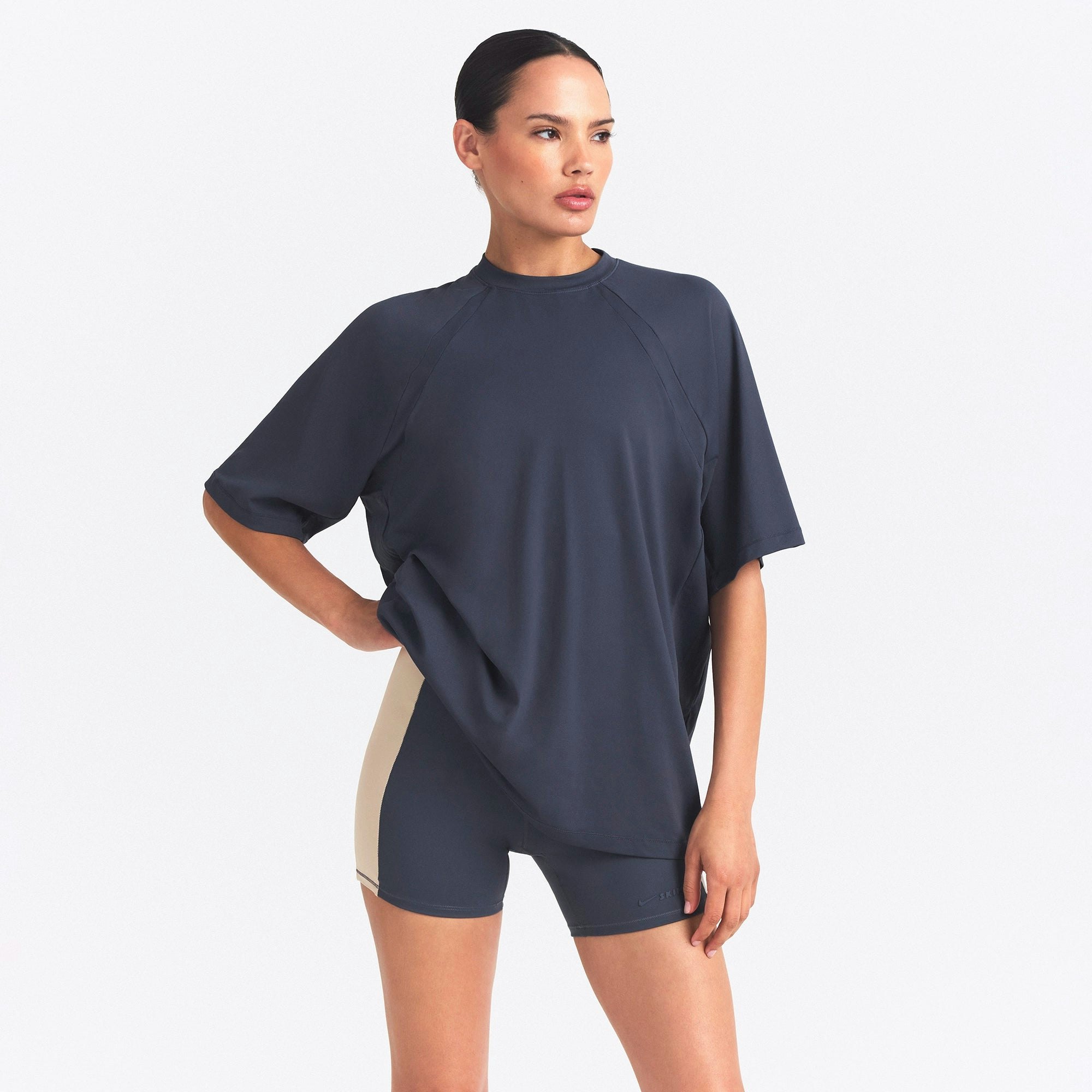 NikeSKIMS AIRY OVERSIZED TEE | DEEP ROYAL ON A MODEL SIDE VIEW @ | FOCUS: 0.0, 1.0, 0.9