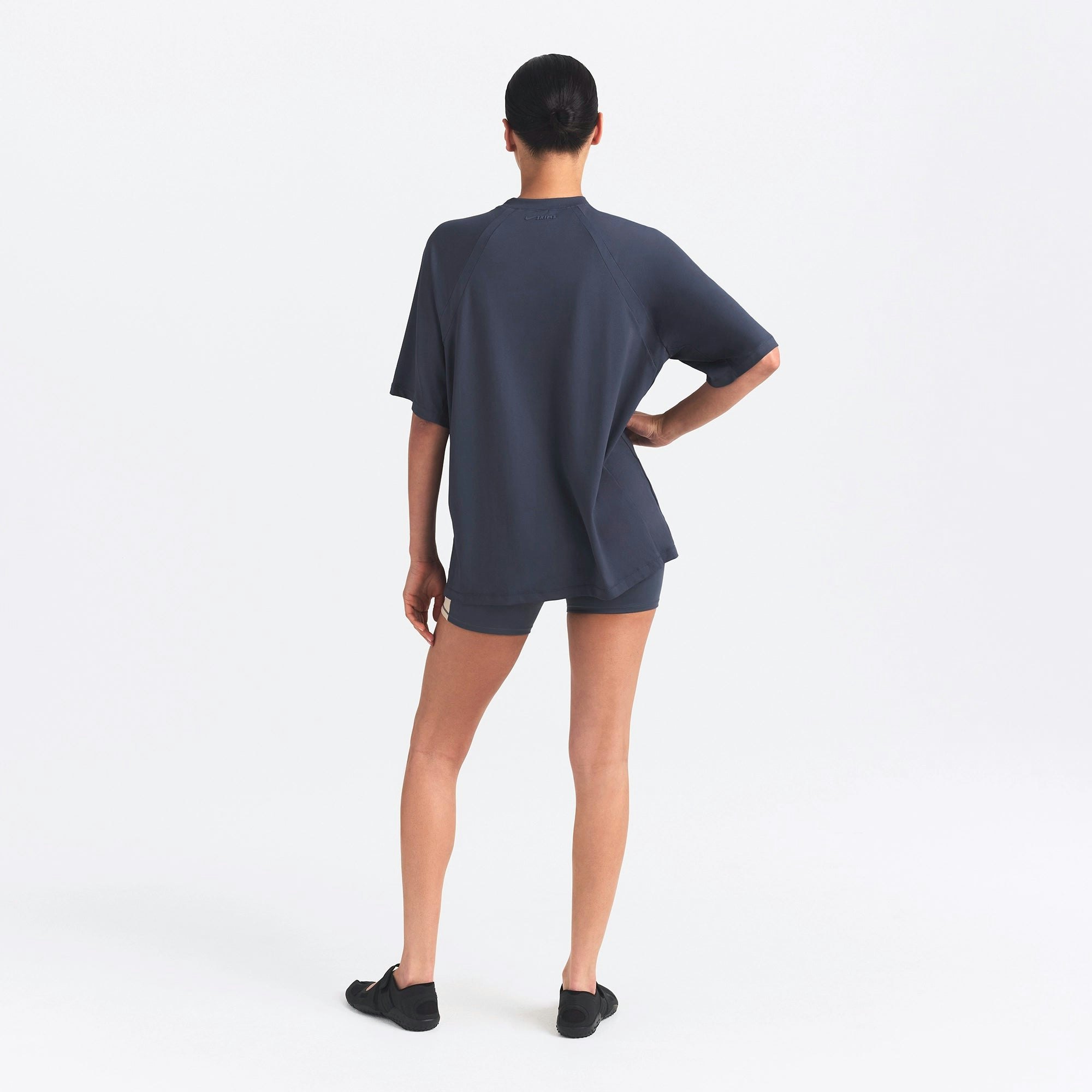 NikeSKIMS AIRY OVERSIZED TEE | DEEP ROYAL ON A MODEL SIDE VIEW @ | FOCUS: 0.0, 1.0, 0.9