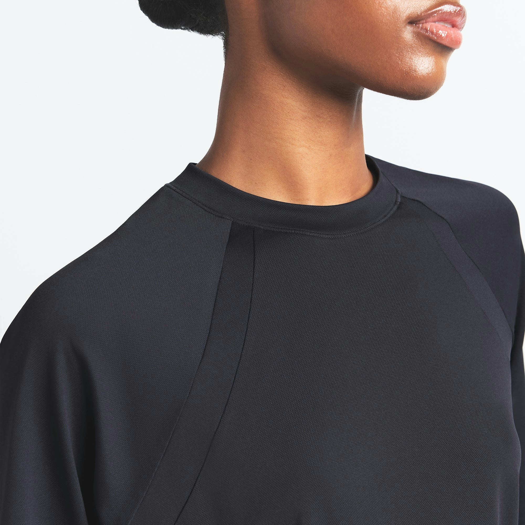 NikeSKIMS AIRY OVERSIZED TEE | OBSIDIAN ON A MODEL SIDE VIEW @ | FOCUS: 0.0, 1.0, 0.9