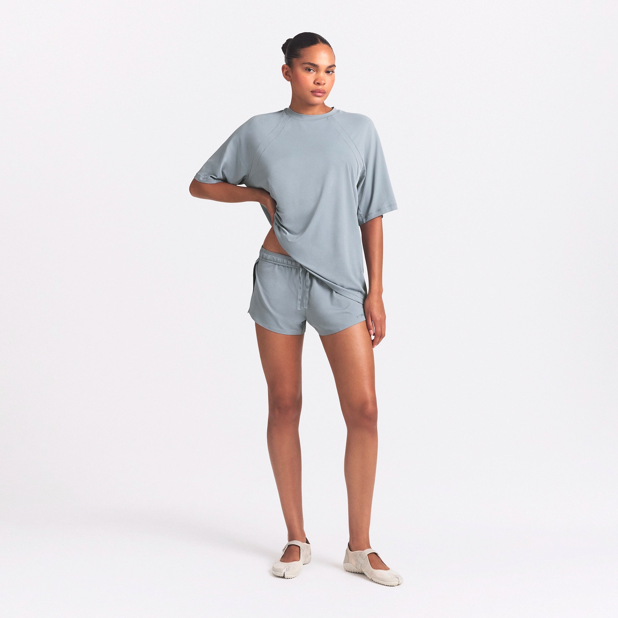 NikeSKIMS AIRY OVERSIZED TEE | WASHED PACIFIC ON A MODEL FRONT VIEW @ | FOCUS: 0.0, 1.0, 0.9