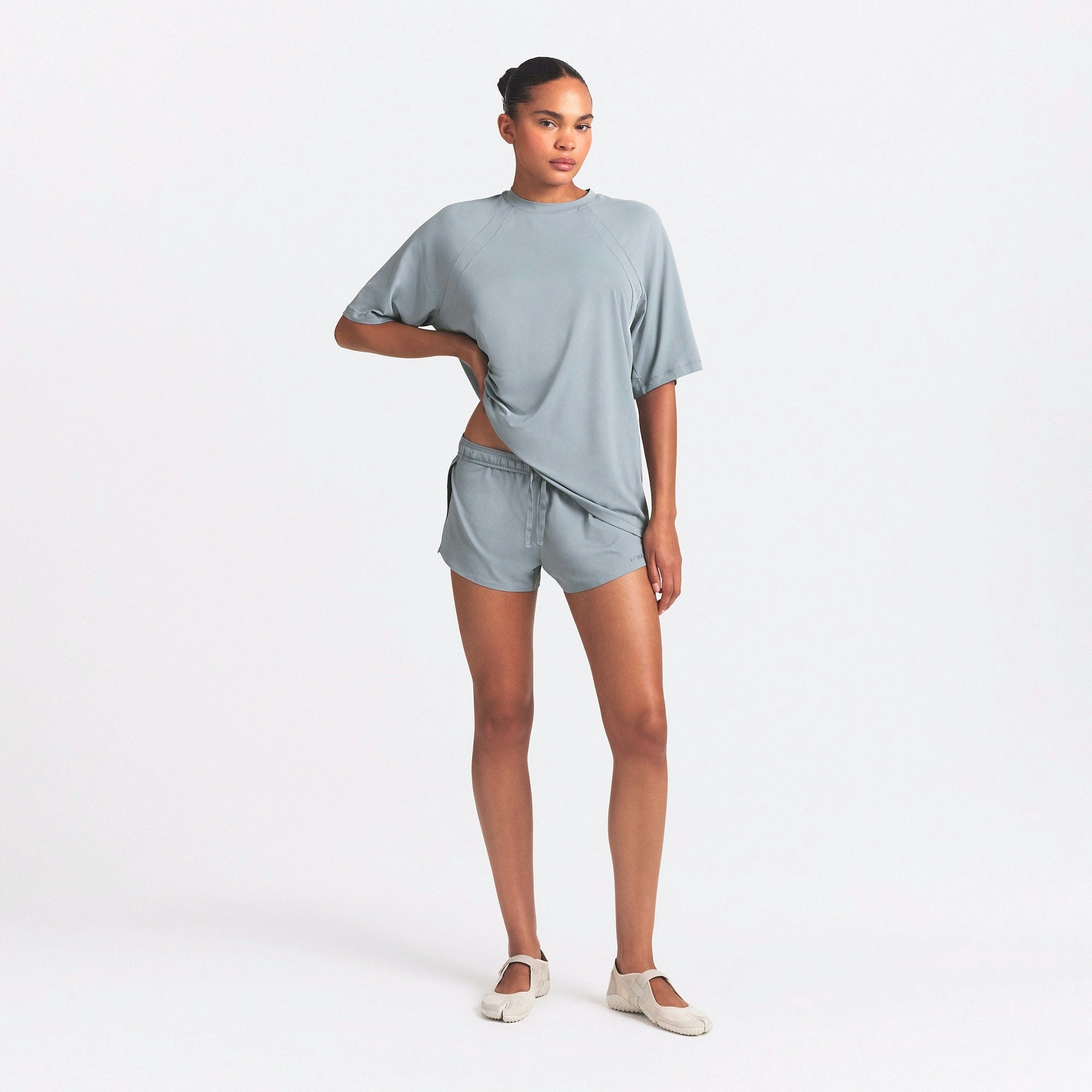 NikeSKIMS AIRY OVERSIZED TEE | WASHED PACIFIC ON A MODEL FRONT VIEW @ | FOCUS: 0.0, 1.0, 0.9
