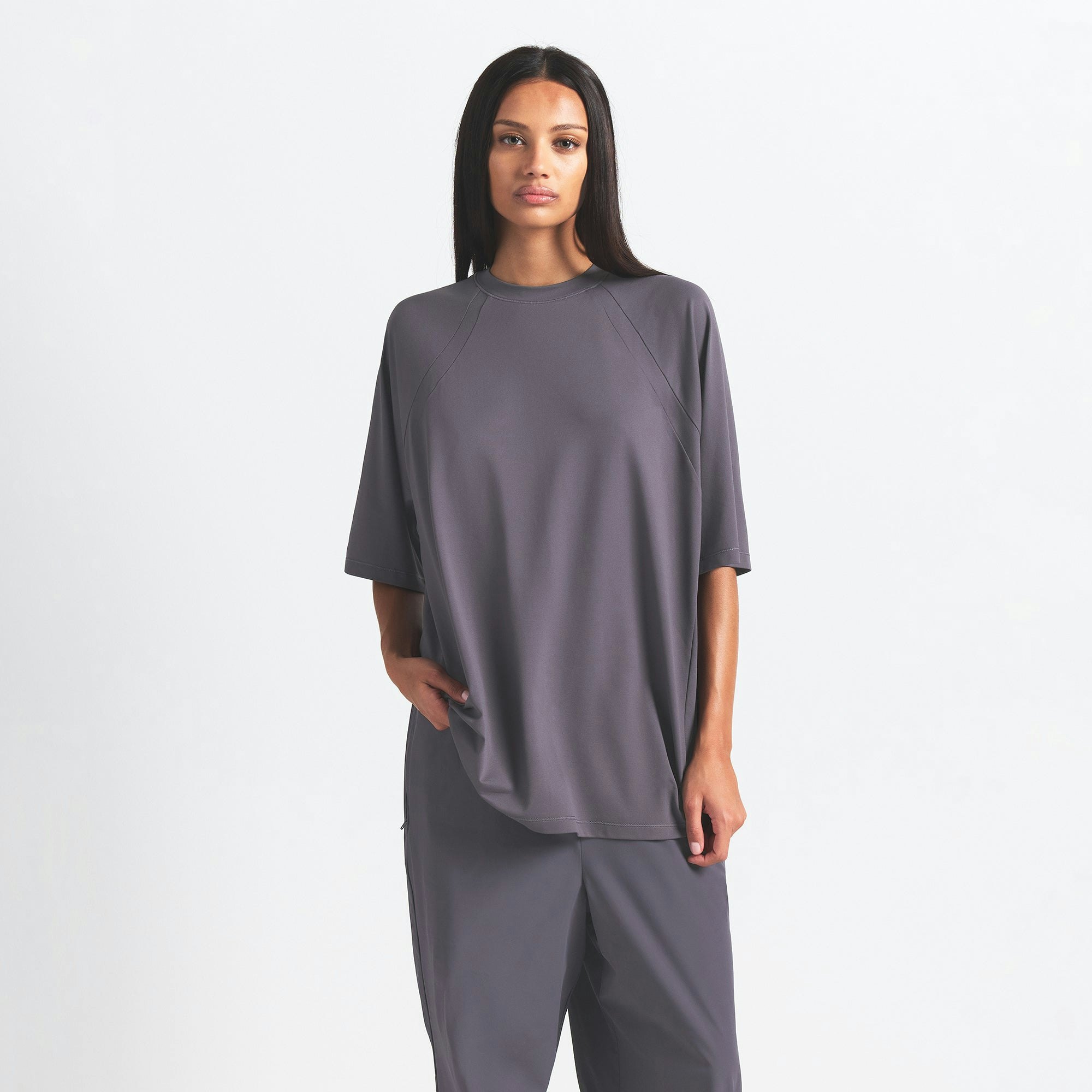 NikeSKIMS AIRY OVERSIZED TEE | RAVEN ON A MODEL SIDE VIEW @ | FOCUS: 0.0, 1.0, 0.9