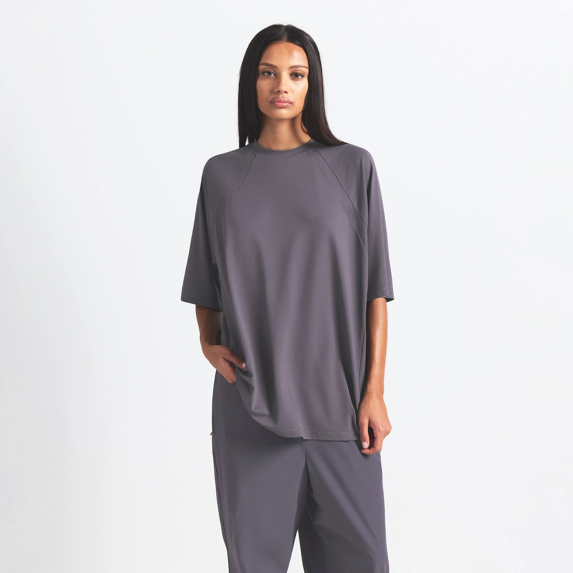 NikeSKIMS AIRY OVERSIZED TEE | RAVEN ON A MODEL SIDE VIEW @ | FOCUS: 0.0, 1.0, 0.9