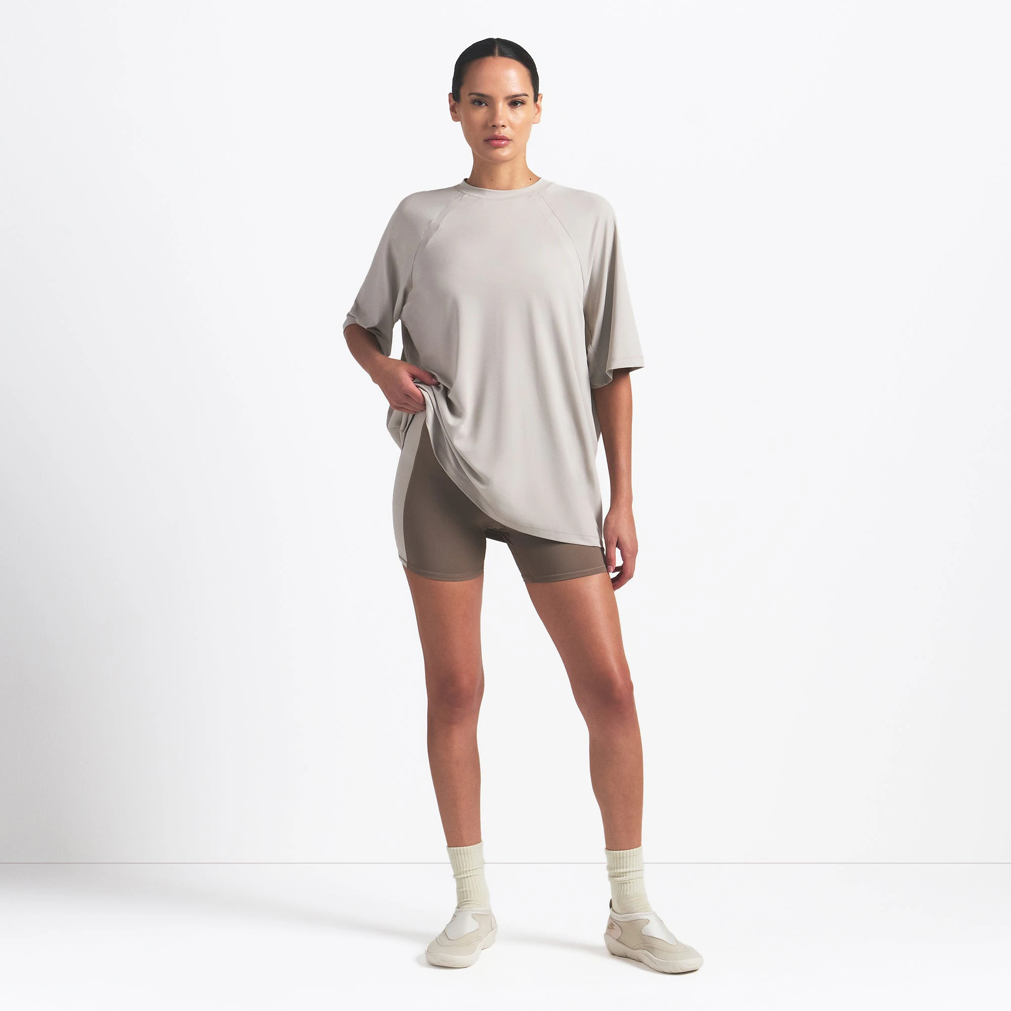 NikeSKIMS AIRY OVERSIZED TEE | STONE ON A MODEL FRONT VIEW @ | FOCUS: 0.0, 1.0, 0.9