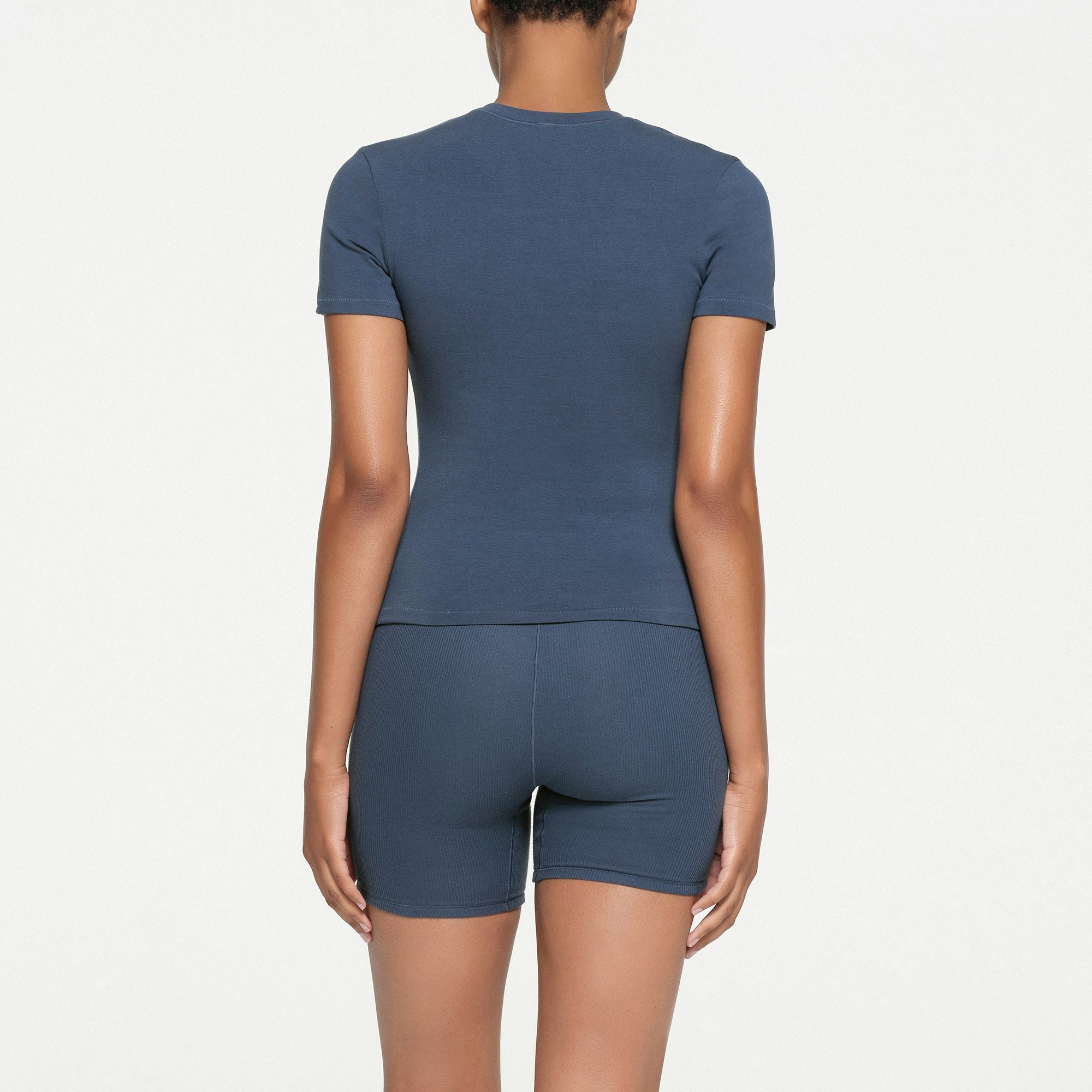 SKIMS FOR TEAM USA COTTON JERSEY OLYMPIC T-SHIRT | NAVY ON A MODEL BACK VIEW
