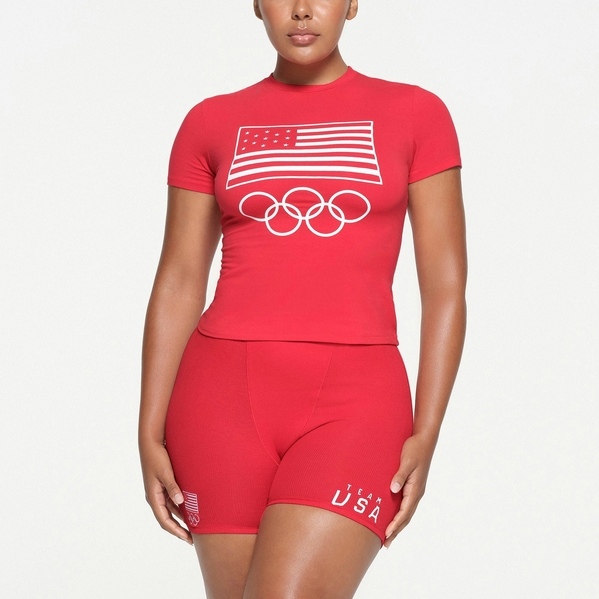 SKIMS FOR TEAM USA COTTON JERSEY OLYMPIC T-SHIRT | RED ON A MODEL FRONT VIEW