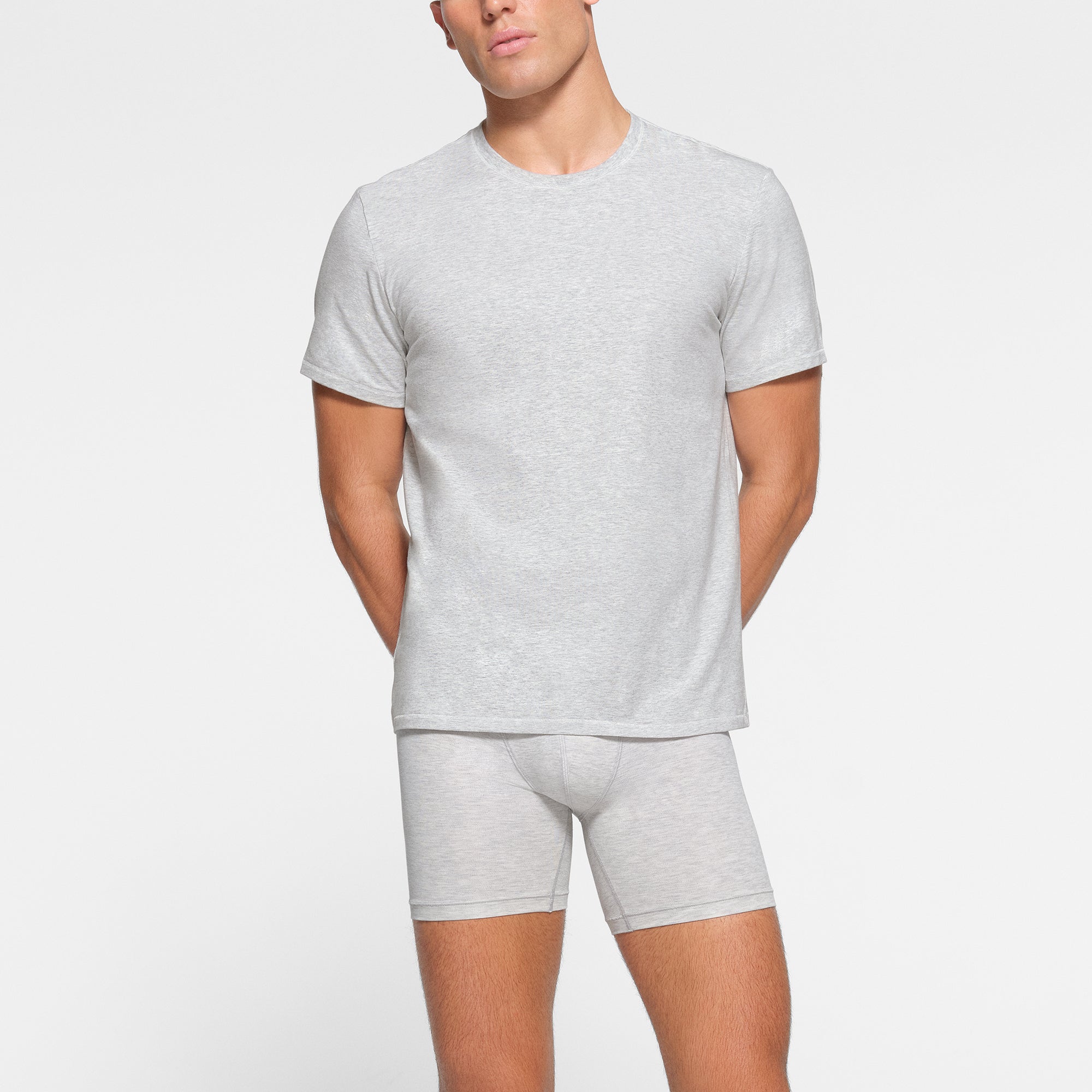 SKIMS COTTON MENS T-SHIRT WORN BY A MODEL IN FRONT VIEW