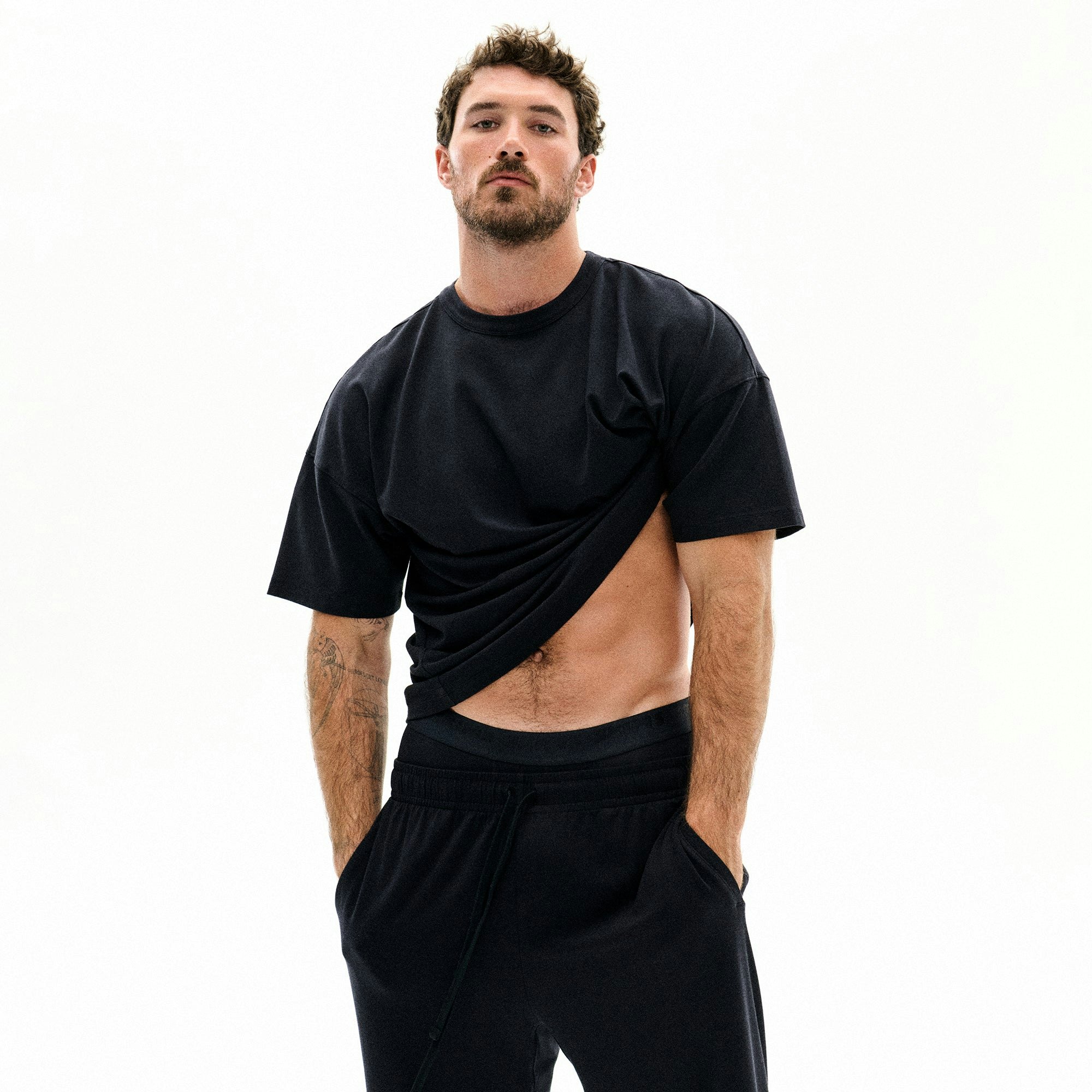 JERSEY LOUNGE MENS RELAXED T-SHIRT | OBSIDIAN ON A MODEL FRONT VIEW CAMPAIGN IMAGERY @ | FOCUS: 0.0, 1.0, 0.9