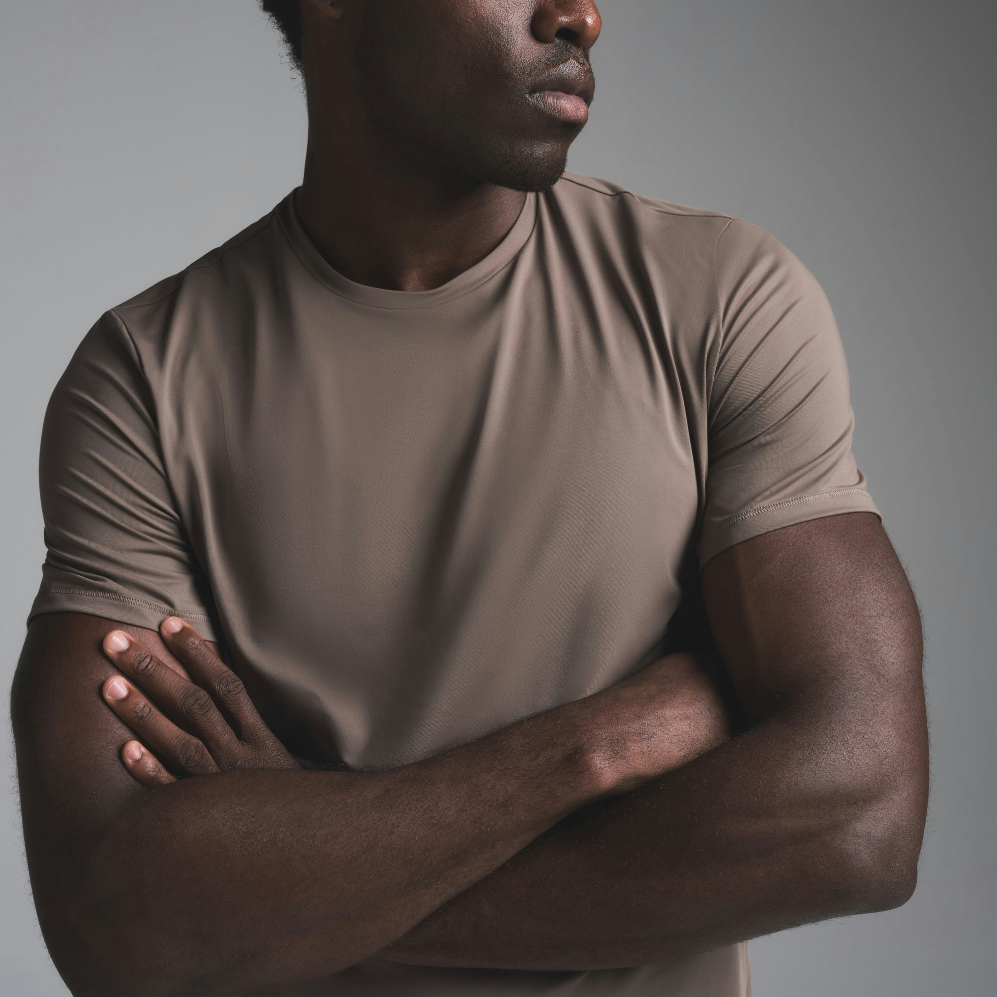 SKIMS SPORT MENS T-SHIRT | AMETHYST ON A MODEL FRONT VIEW