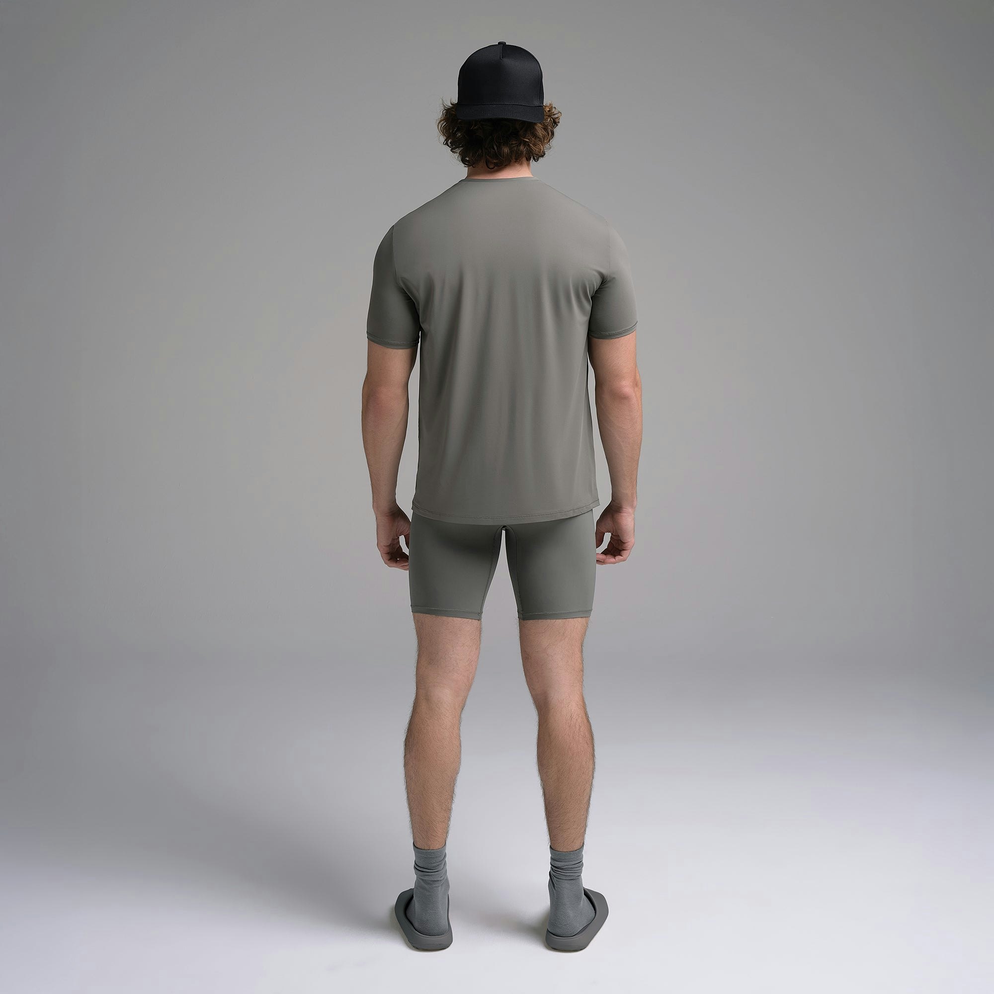 SKIMS SPORT MENS T-SHIRT | GUNMETAL ON A MODEL SIDE VIEW | FOCUS: 0.0, 1.0, 0.9