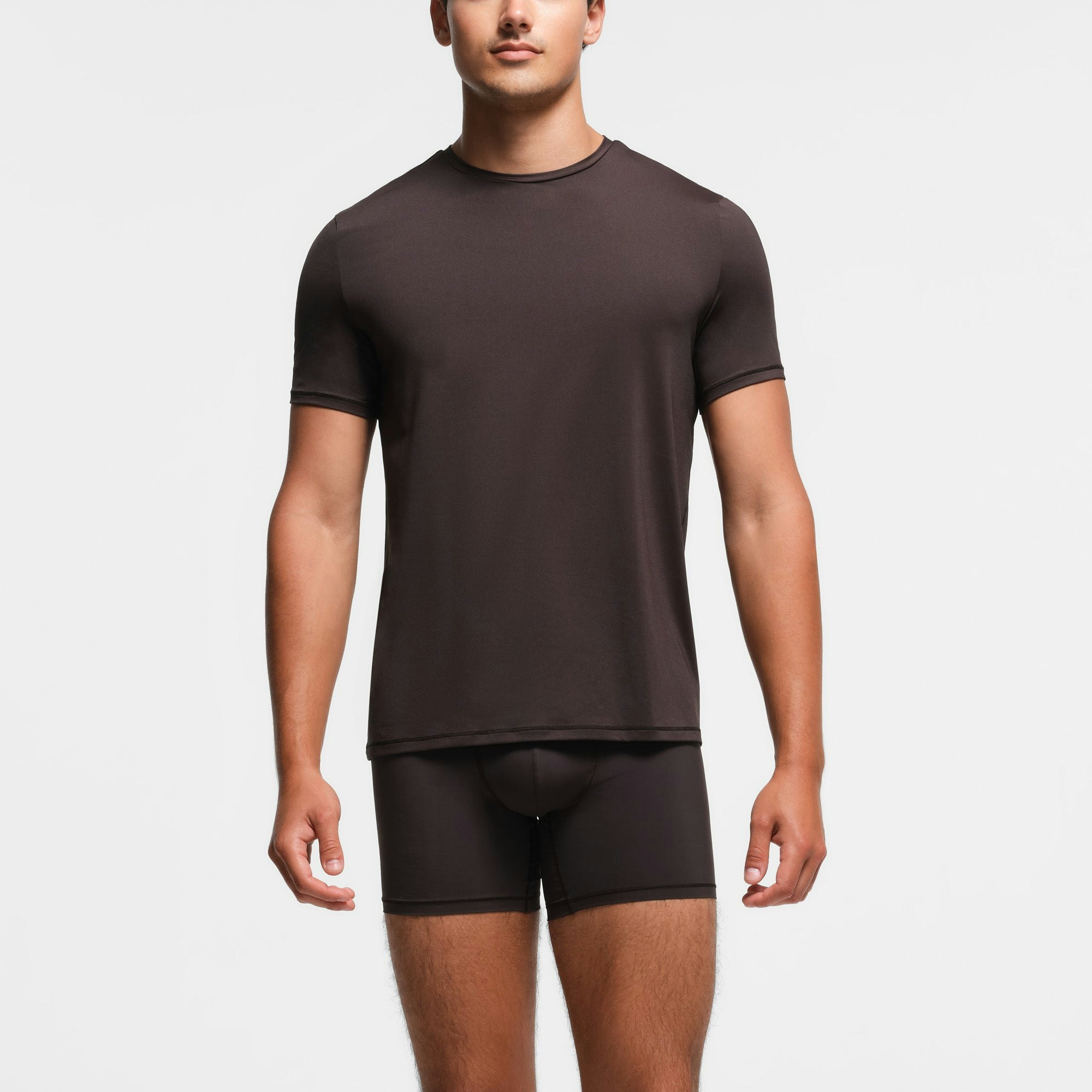 SKIMS SPORT MENS T-SHIRT | PHOENIX ON A MODEL FRONT VIEW