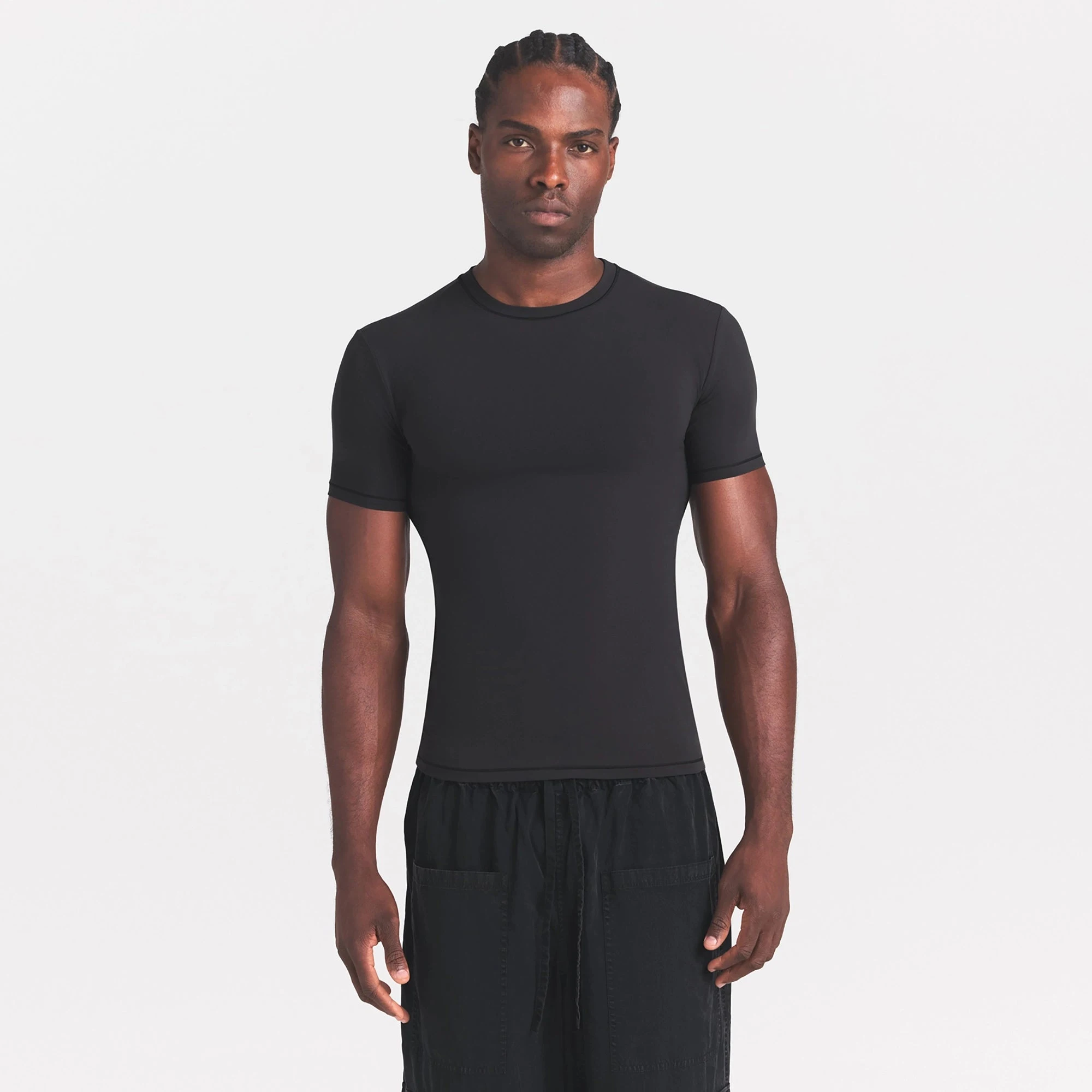 FITS EVERYBODY MENS SLIM T-SHIRT | ONYX ON A MODEL SIDE VIEW