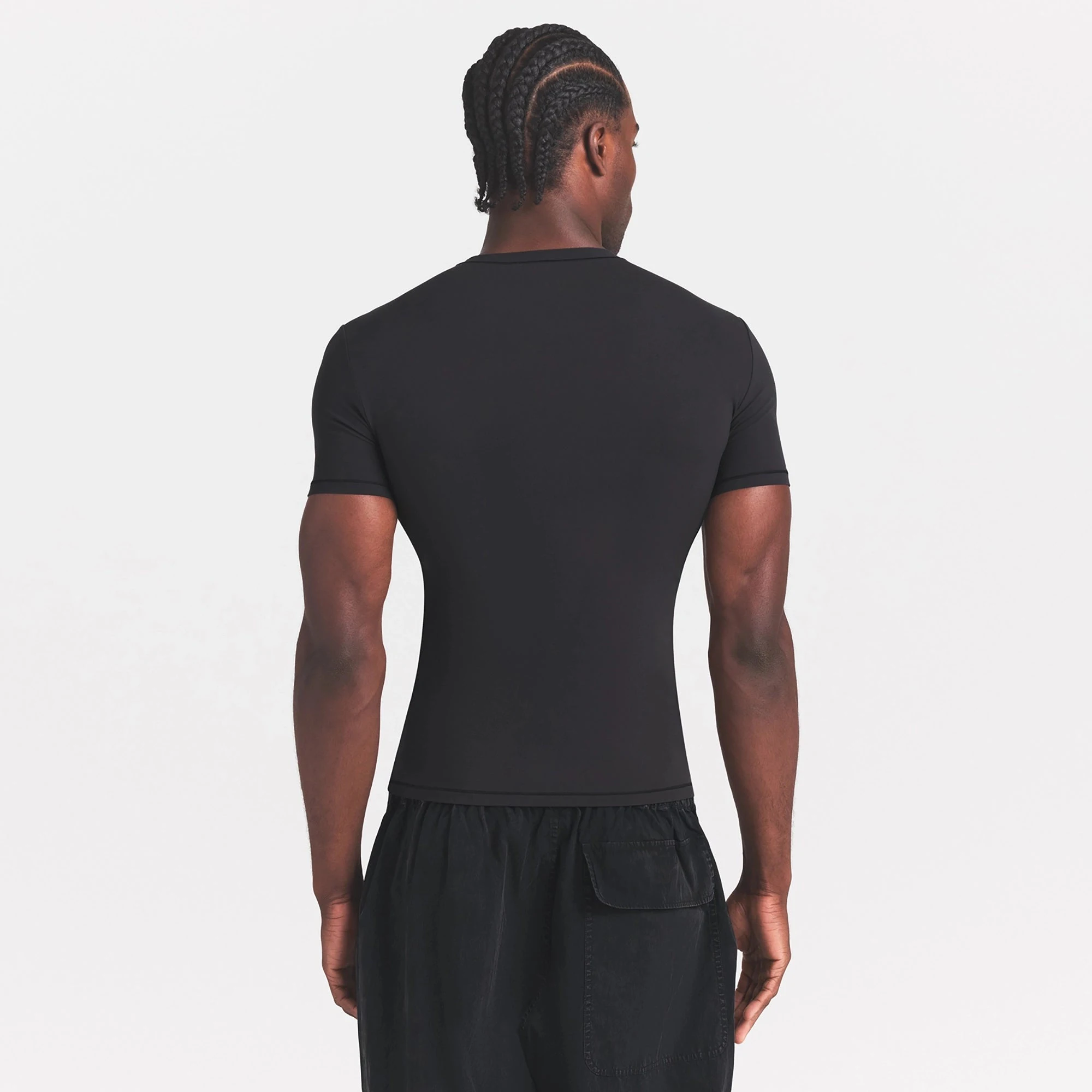 FITS EVERYBODY MENS SLIM T-SHIRT | ONYX ON A MODEL SIDE VIEW
