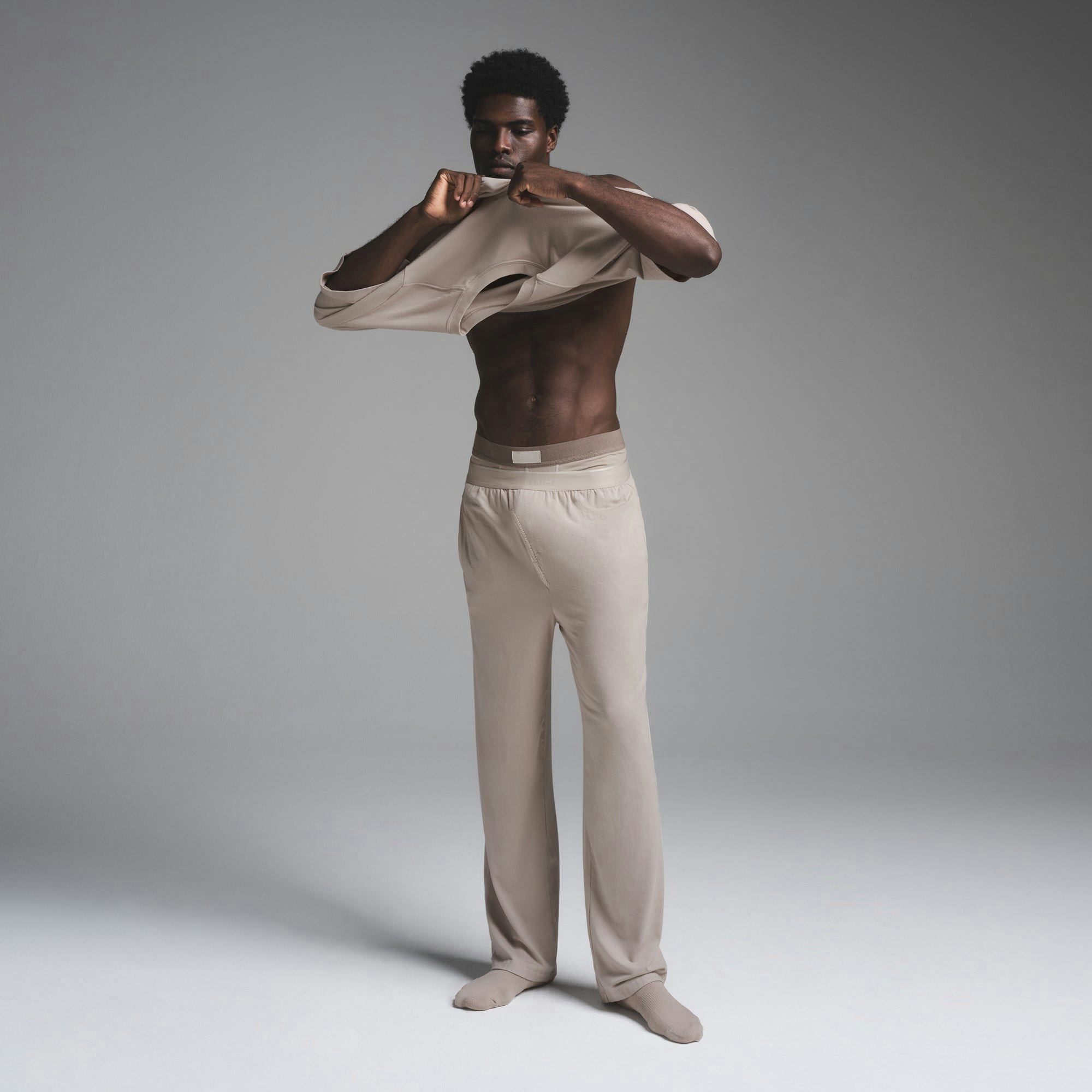 JERSEY SLEEP MENS T-SHIRT | STONE ON A MODEL FRONT VIEW