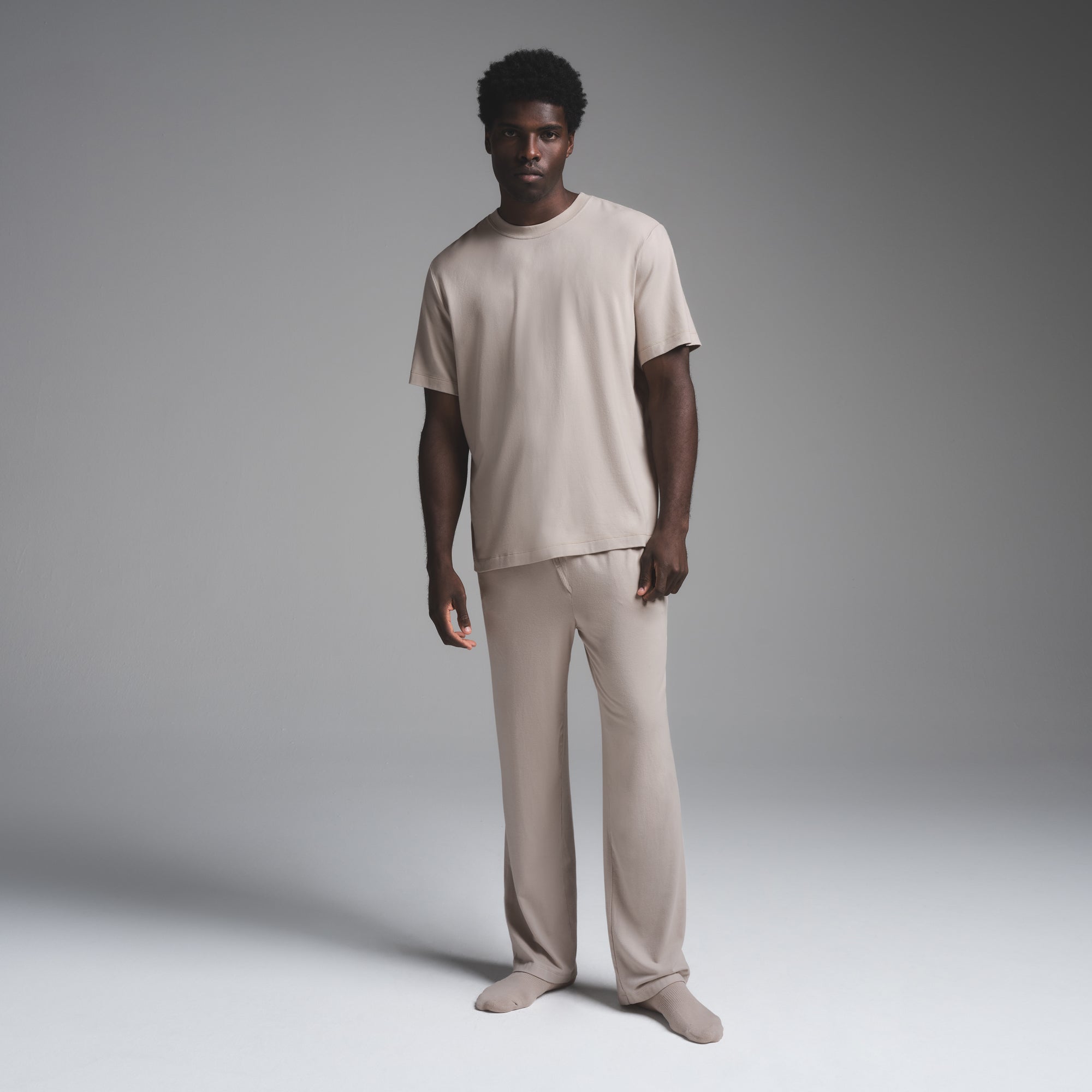 JERSEY SLEEP MENS T-SHIRT | STONE ON A MODEL FRONT VIEW | FOCUS: 0.0, 1.0, 0.9