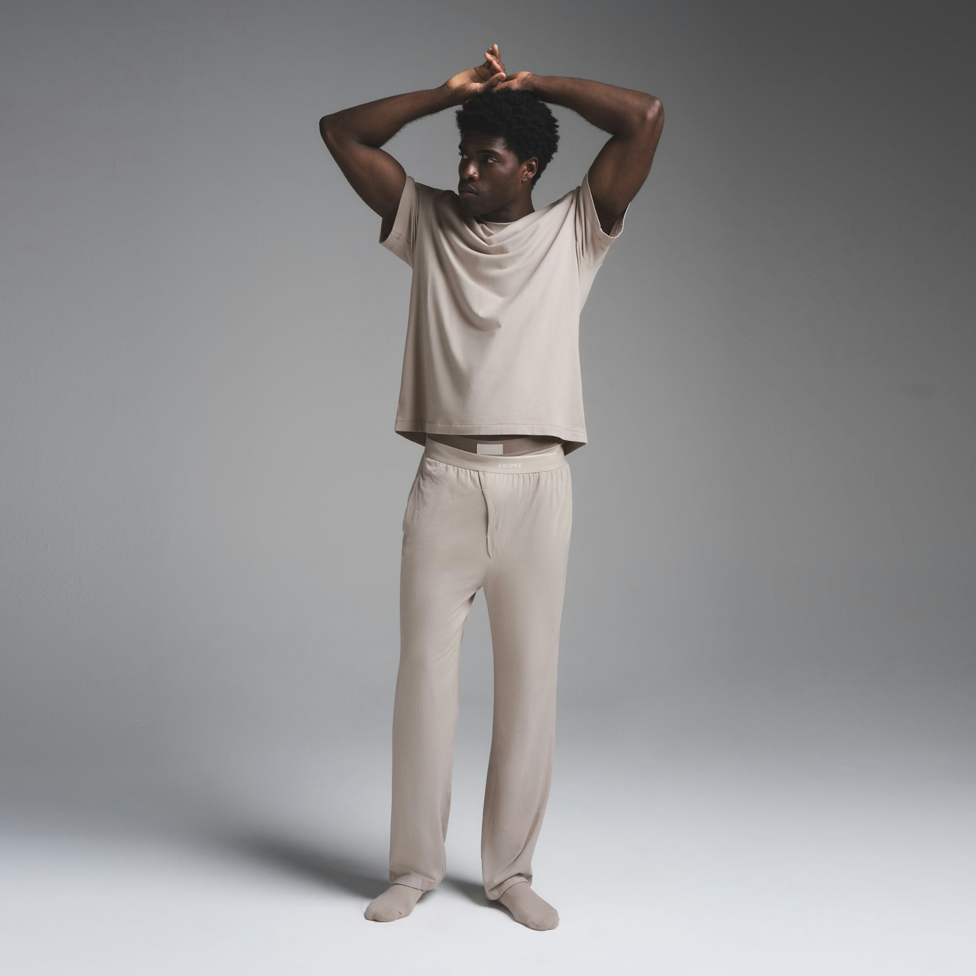 JERSEY SLEEP MENS T-SHIRT | STONE ON A MODEL FRONT VIEW