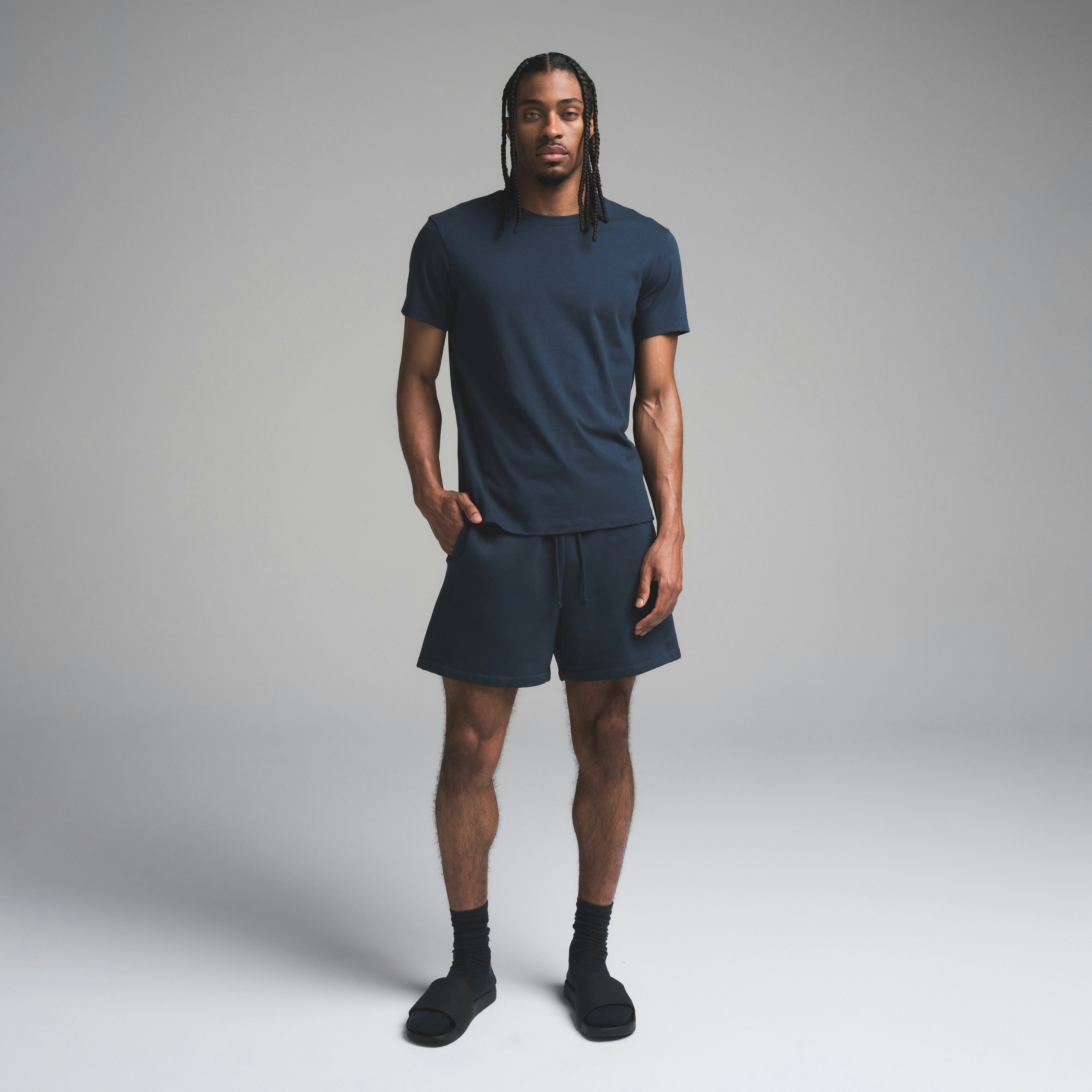 SKIMS COTTON MENS CLASSIC T-SHIRT | NAVY ON A MODEL FRONT VIEW | FOCUS: 0.0, 1.0, 0.9