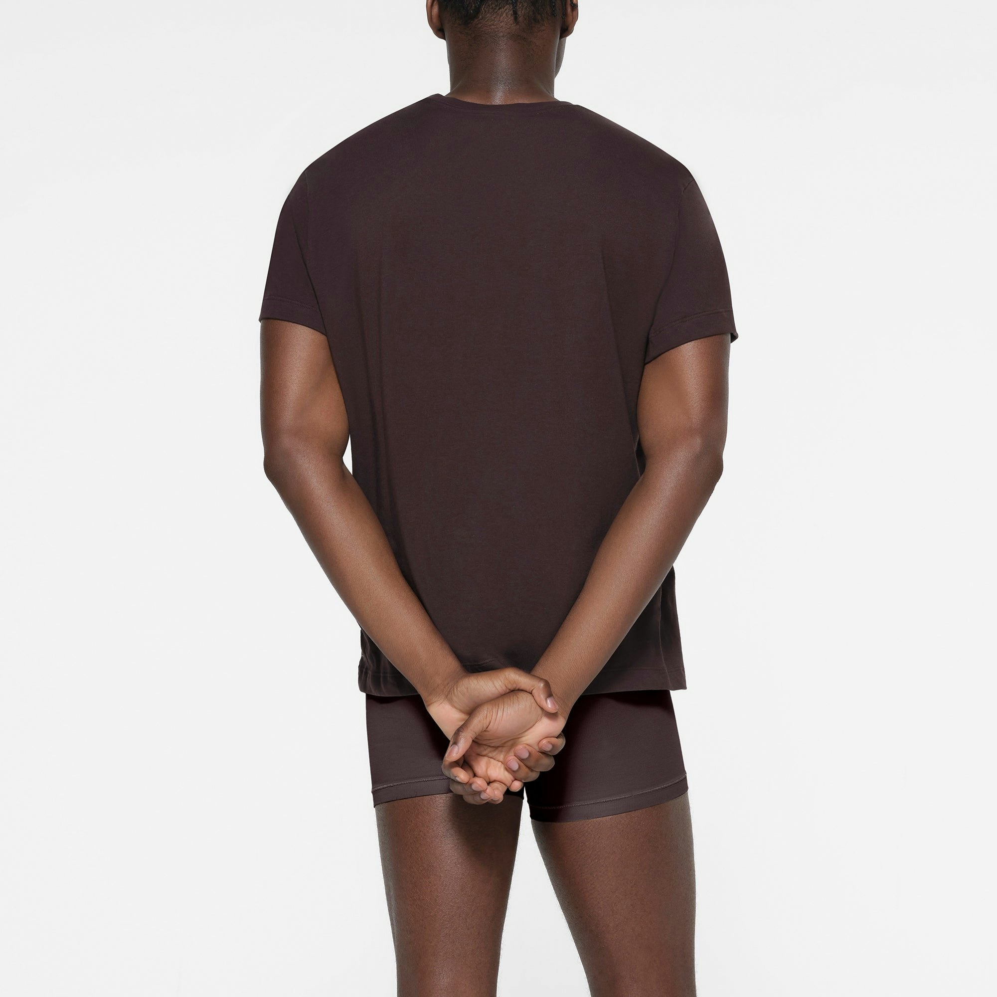 SKIMS COTTON MENS CLASSIC T-SHIRT | PHOENIX ON A MODEL BACK VIEW