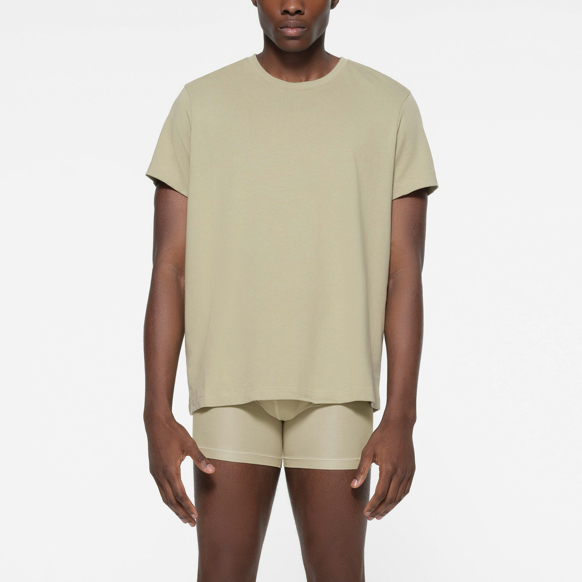 SKIMS COTTON MENS CLASSIC T-SHIRT | PHOSPHORUS ON A MODEL FRONT VIEW