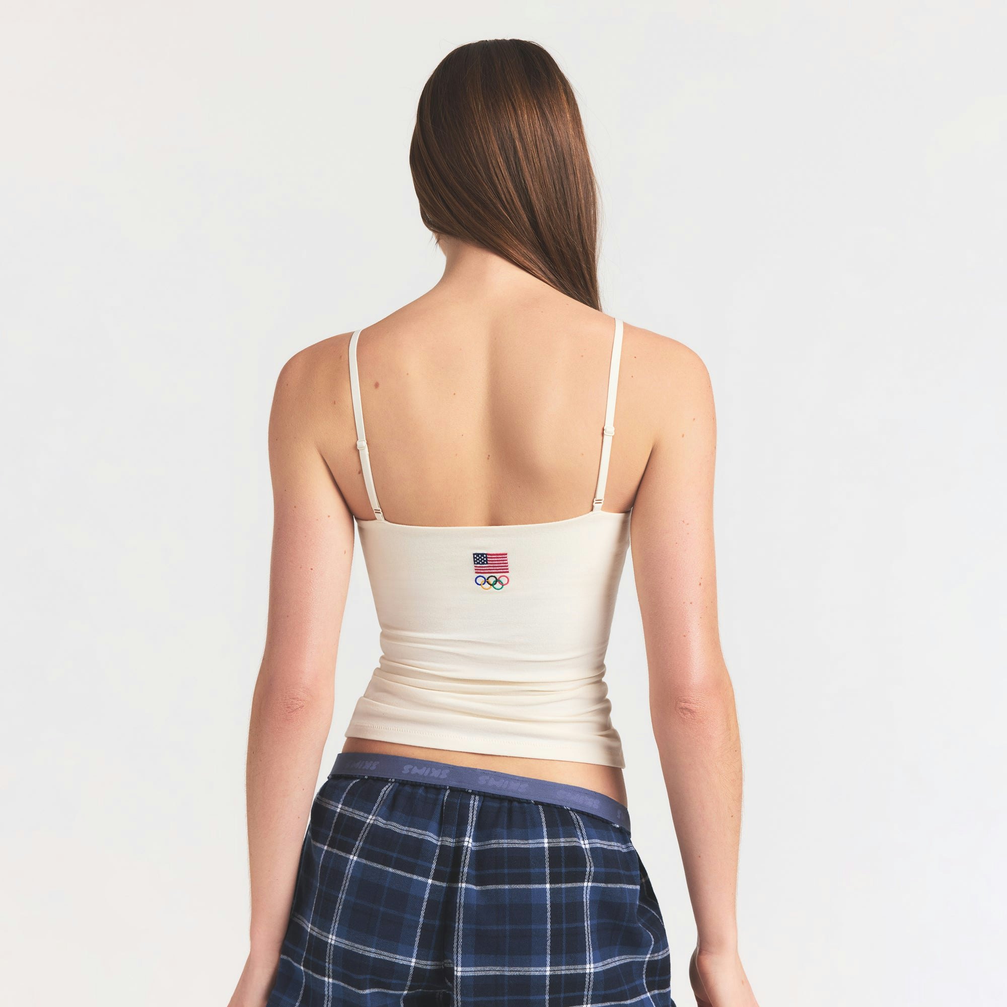 SKIMS FOR TEAM USA COTTON JERSEY OLYMPIC CAMI | ECRU ON A MODEL SIDE VIEW @ | FOCUS: 0.0, 1.0, 0.9