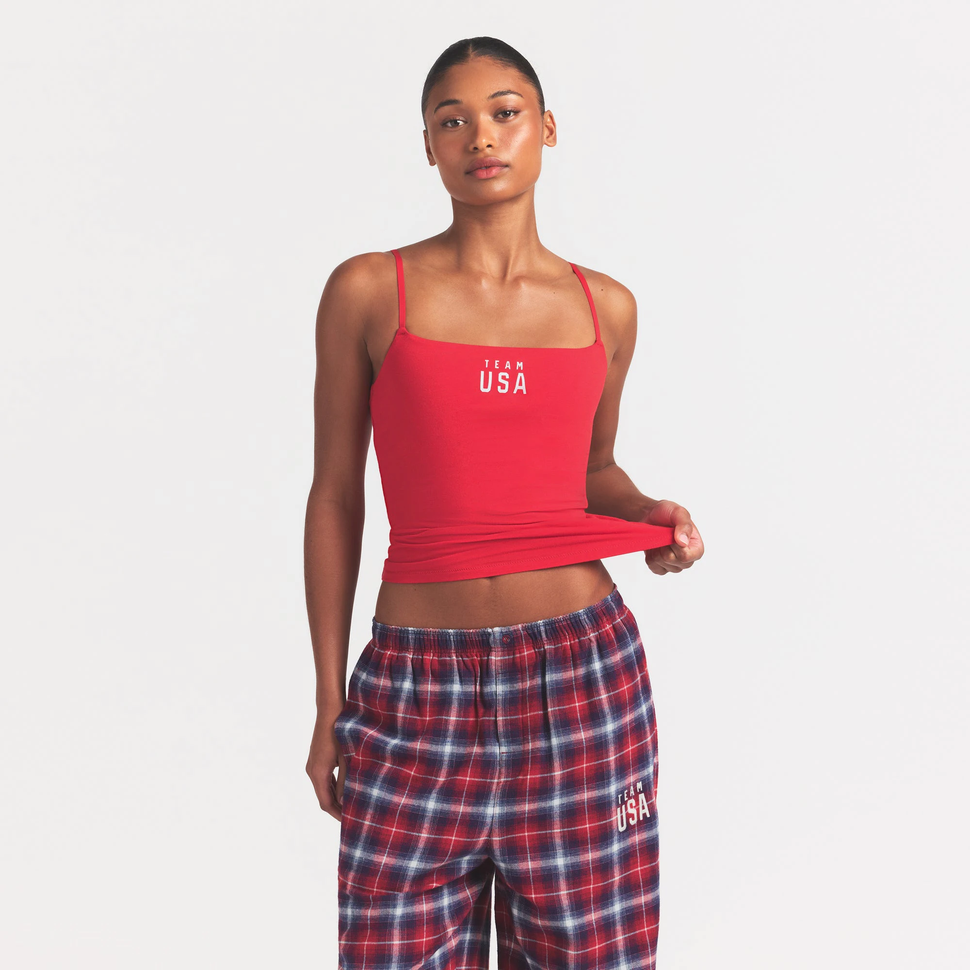 SKIMS FOR TEAM USA COTTON JERSEY OLYMPIC CAMI | RED ON A MODEL SIDE VIEW @ | FOCUS: 0.0, 1.0, 0.9