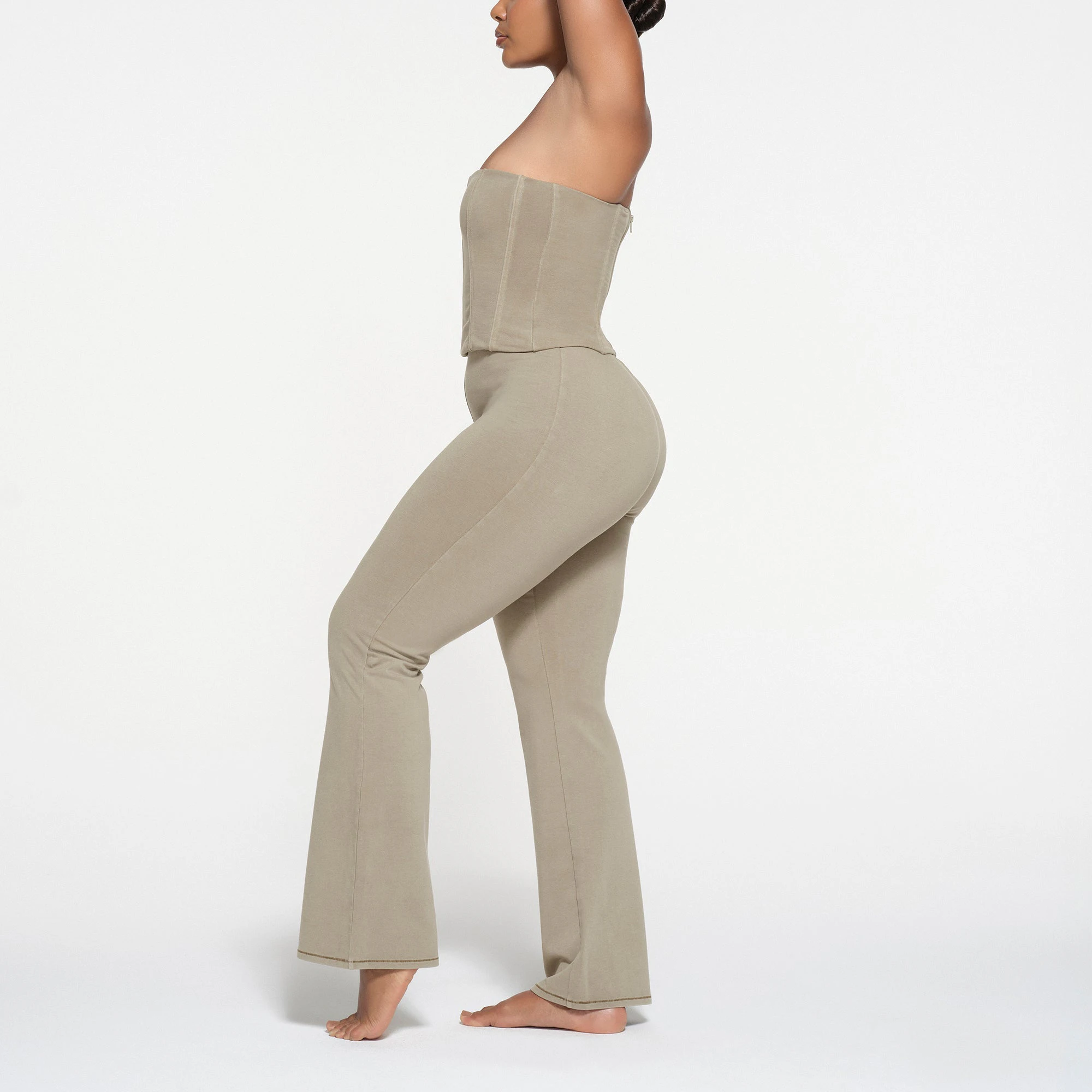 OUTDOOR CORSET | TAUPE ON A MODEL SIDE VIEW