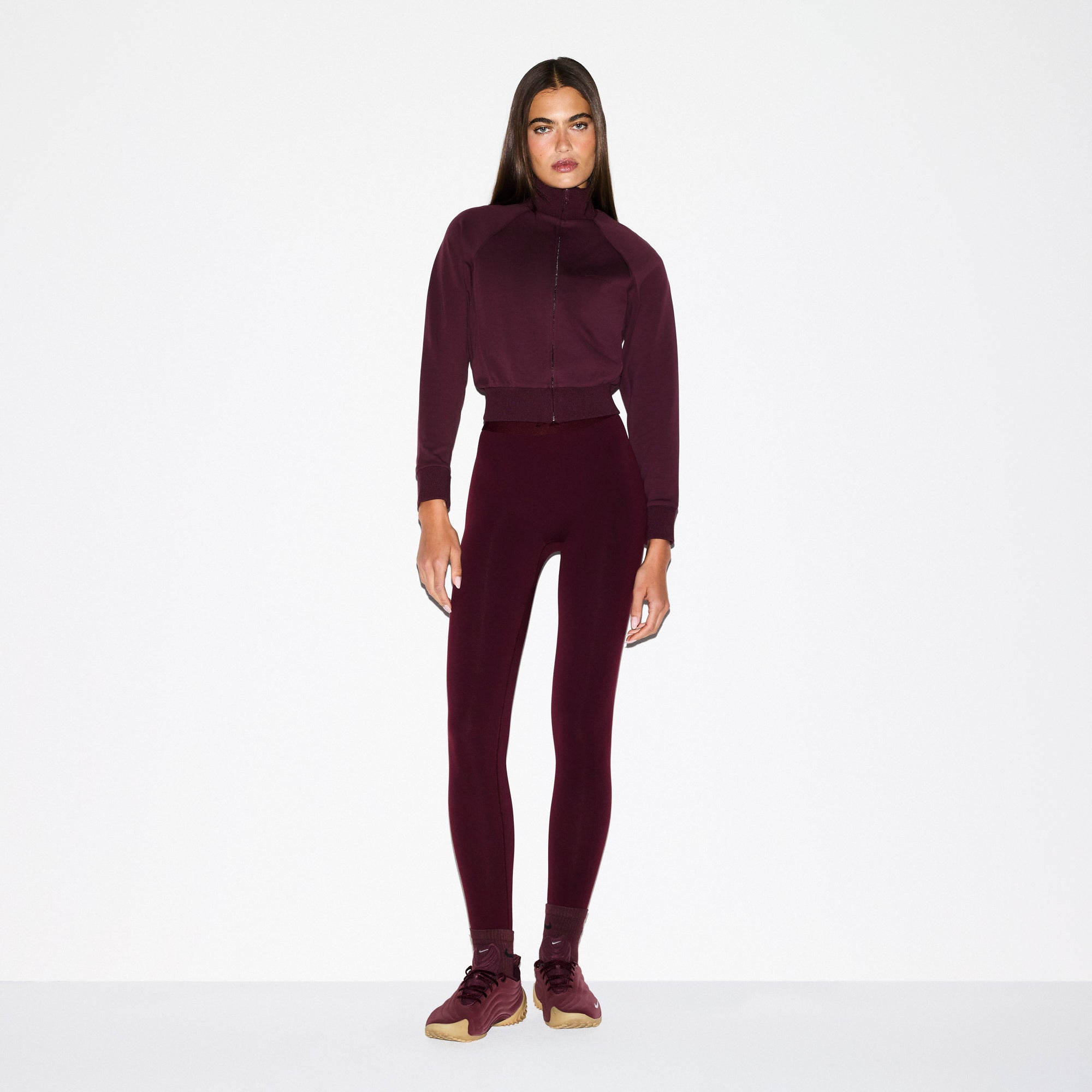 NikeSKIMS MATTE TRICOT TRACK JACKET | CURRANT ON A MODEL FRONT VIEW @ | FOCUS: 0.0, 1.0, 0.9