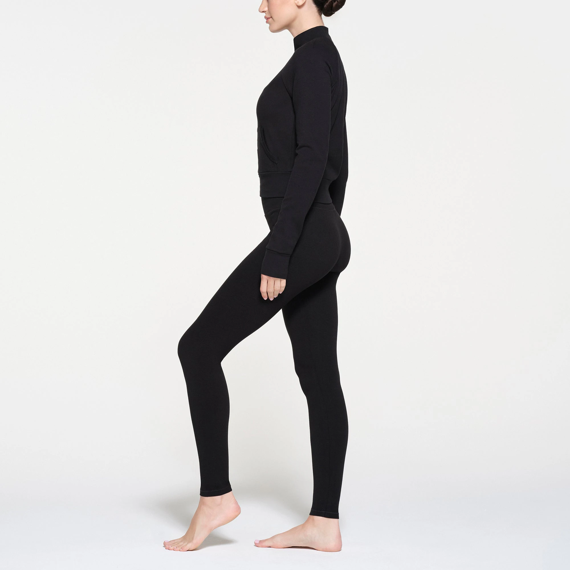 OUTDOOR TRACK JACKET | ONYX ON A MODEL SIDE VIEW