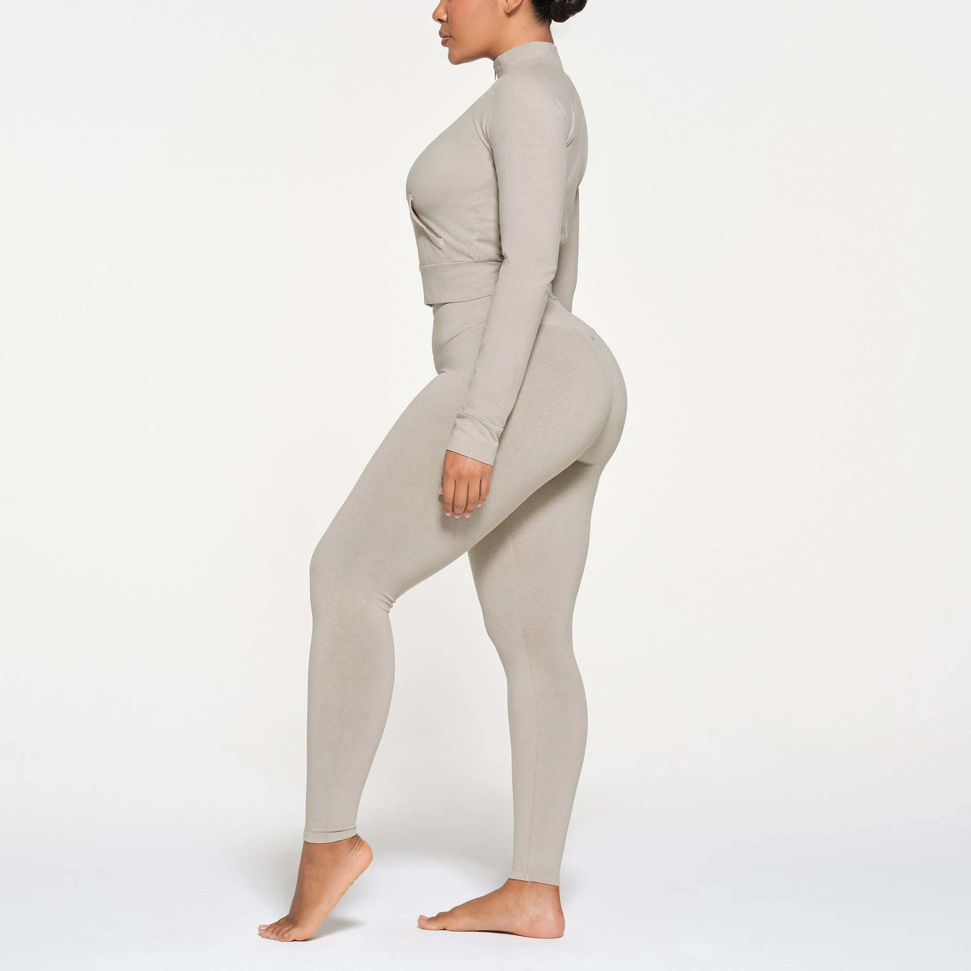 OUTDOOR TRACK JACKET | STONE ON A MODEL SIDE VIEW