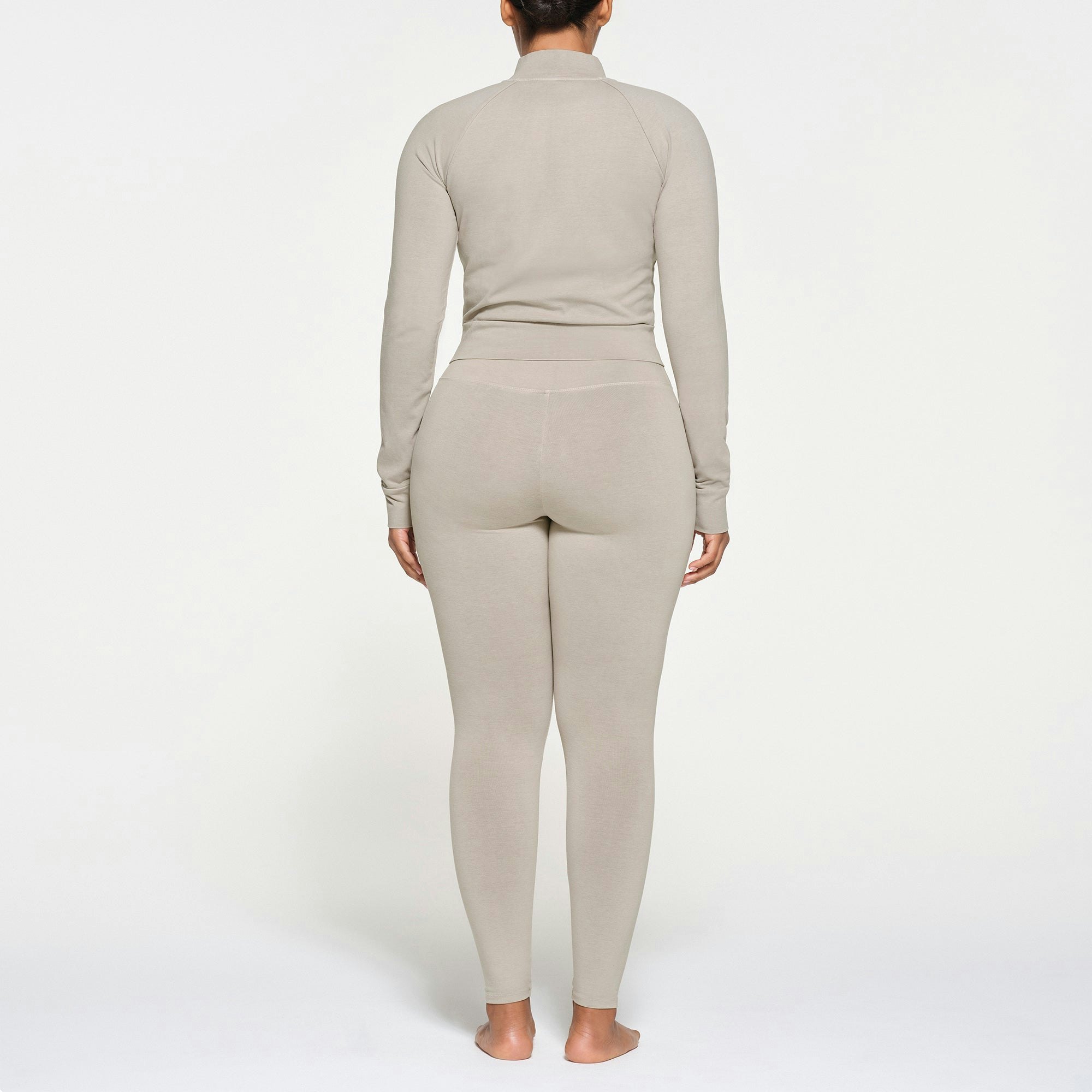 OUTDOOR TRACK JACKET | STONE ON A MODEL BACK VIEW