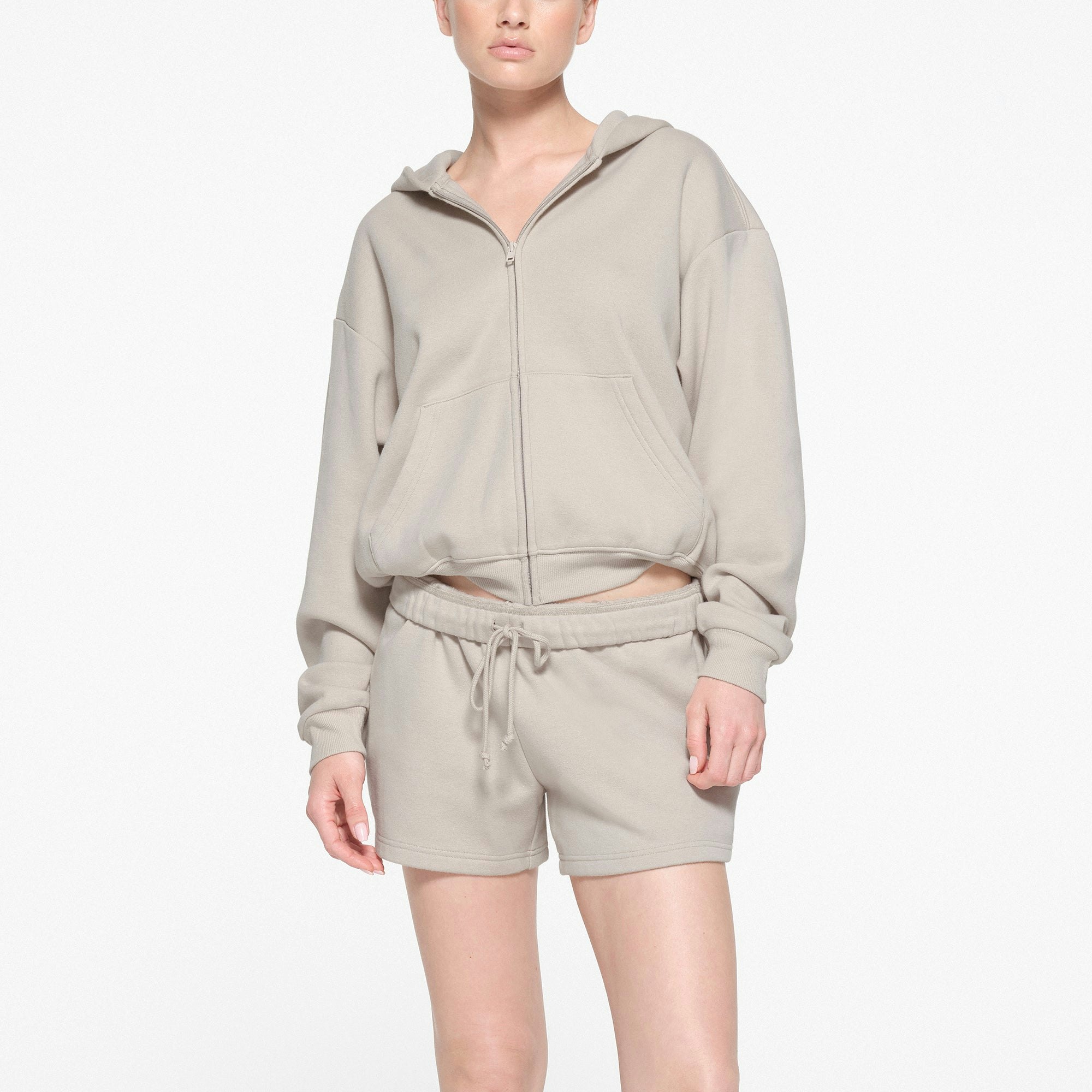 COTTON FLEECE CLASSIC ZIP UP HOODIE | STONE ON A MODEL FRONT VIEW