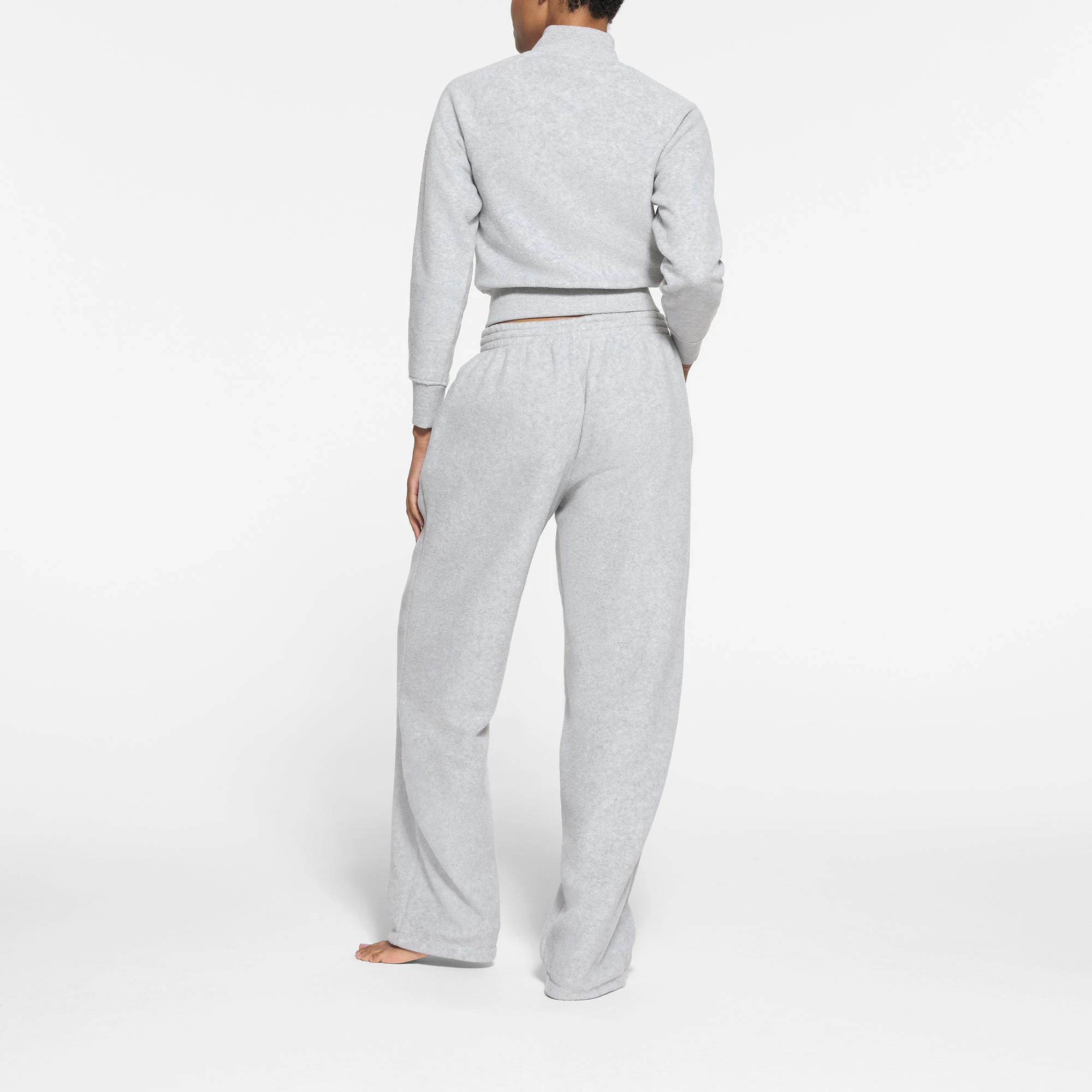 FLEECE LOUNGE TRACK JACKET | LIGHT HEATHER GREY ON A MODEL BACK VIEW