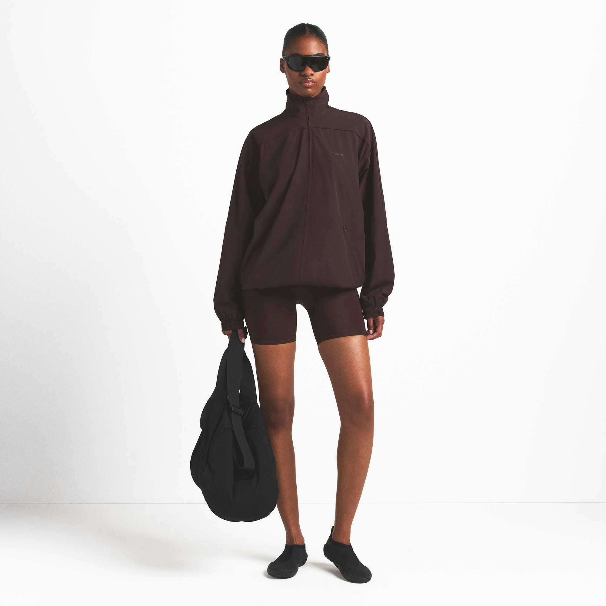 NikeSKIMS WOVEN NYLON OVERSIZED TRACK JACKET | PHOENIX ON A MODEL FRONT VIEW @ | FOCUS: 0.0, 1.0, 0.9