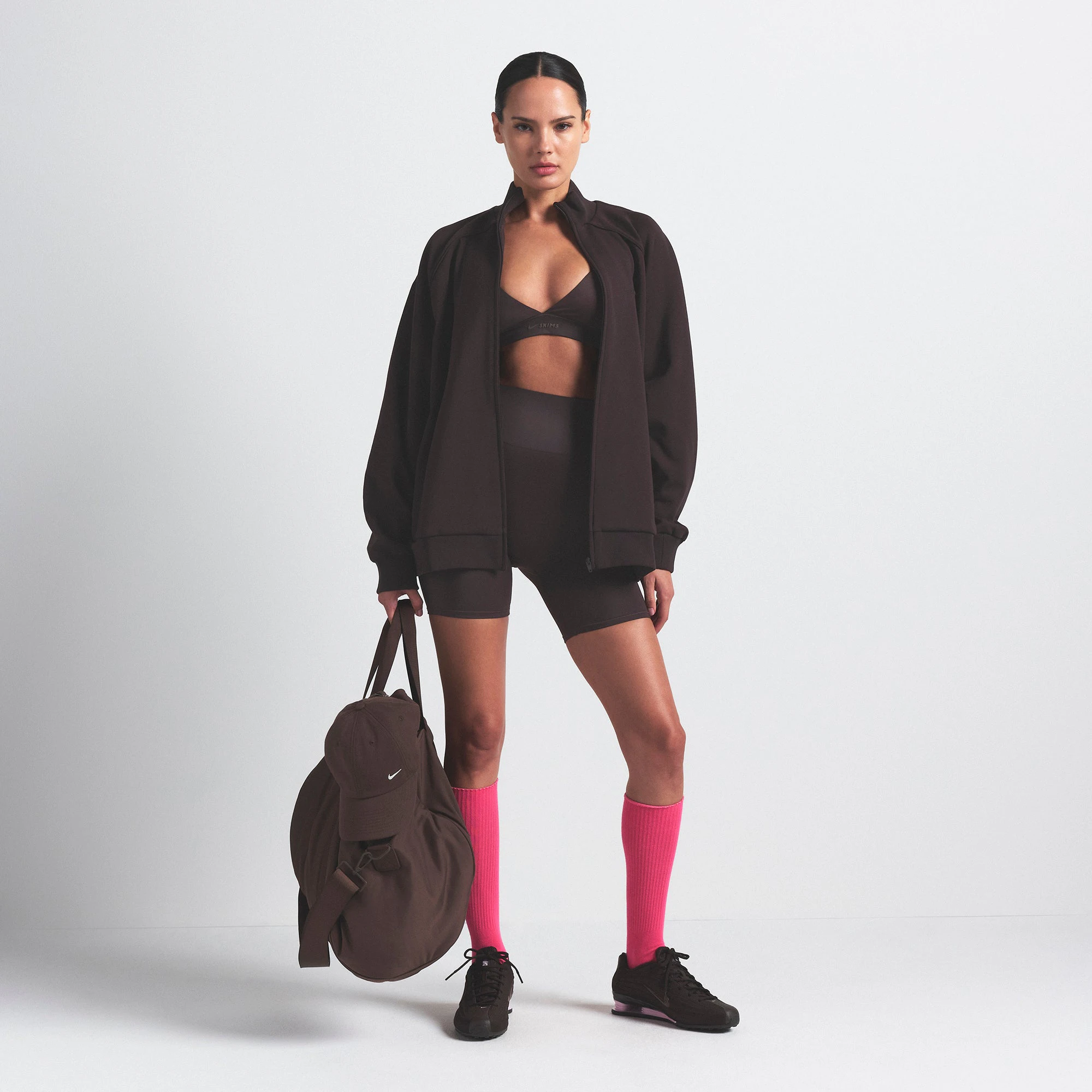 NikeSKIMS MATTE TRICOT OVERSIZED TRACK JACKET | DARK ROAST ON A MODEL FRONT VIEW @ | FOCUS: 0.0, 1.0, 0.9