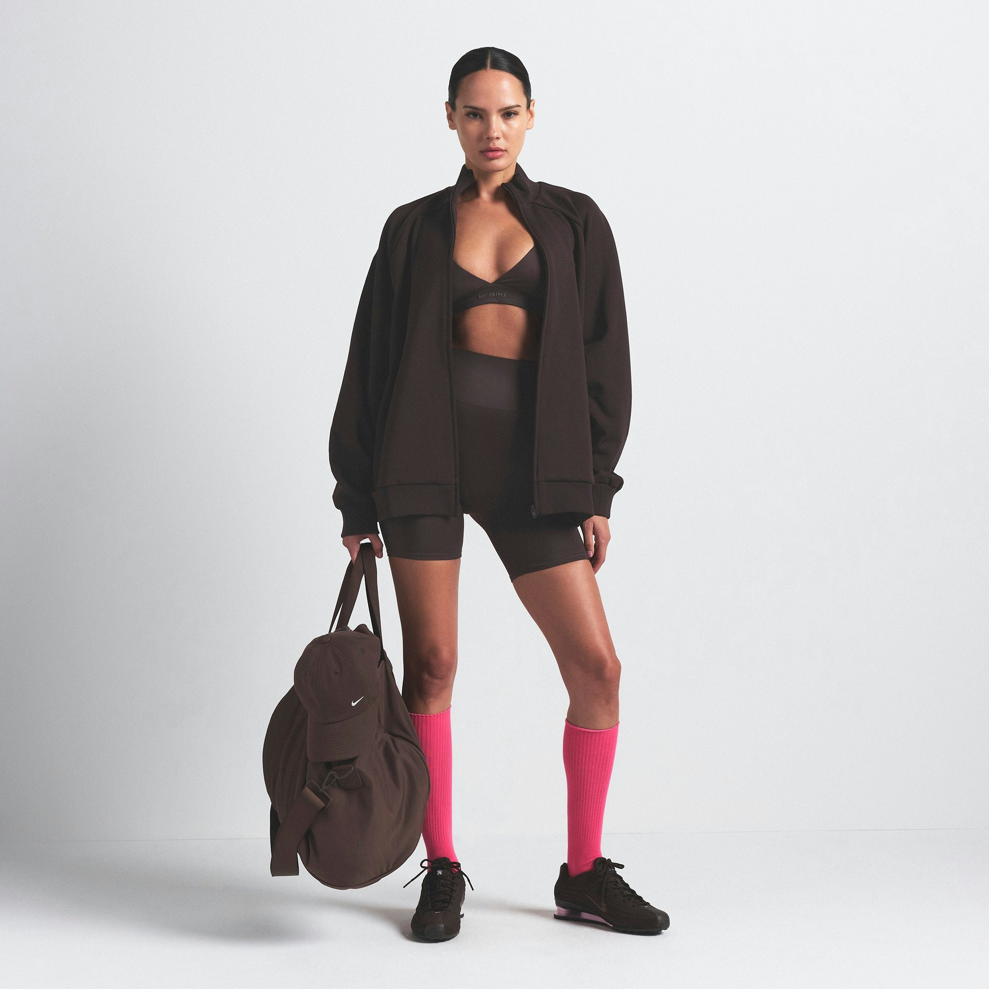 NikeSKIMS MATTE TRICOT OVERSIZED TRACK JACKET | DARK ROAST ON A MODEL FRONT VIEW @ | FOCUS: 0.0, 1.0, 0.9