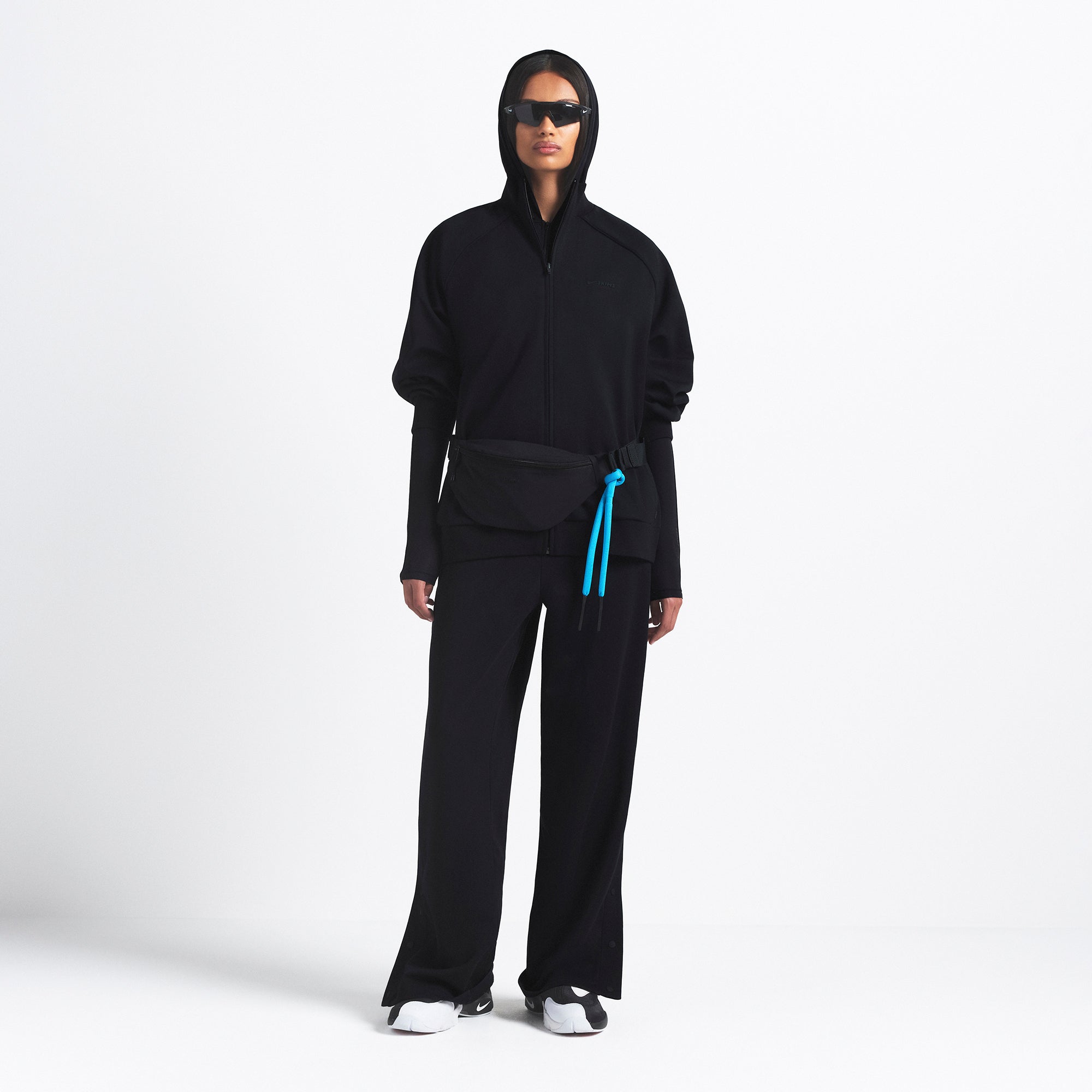 NikeSKIMS MATTE TRICOT OVERSIZED TRACK JACKET | OBSIDIAN ON A MODEL FRONT VIEW @ | FOCUS: 0.9, 0.1, 0.7